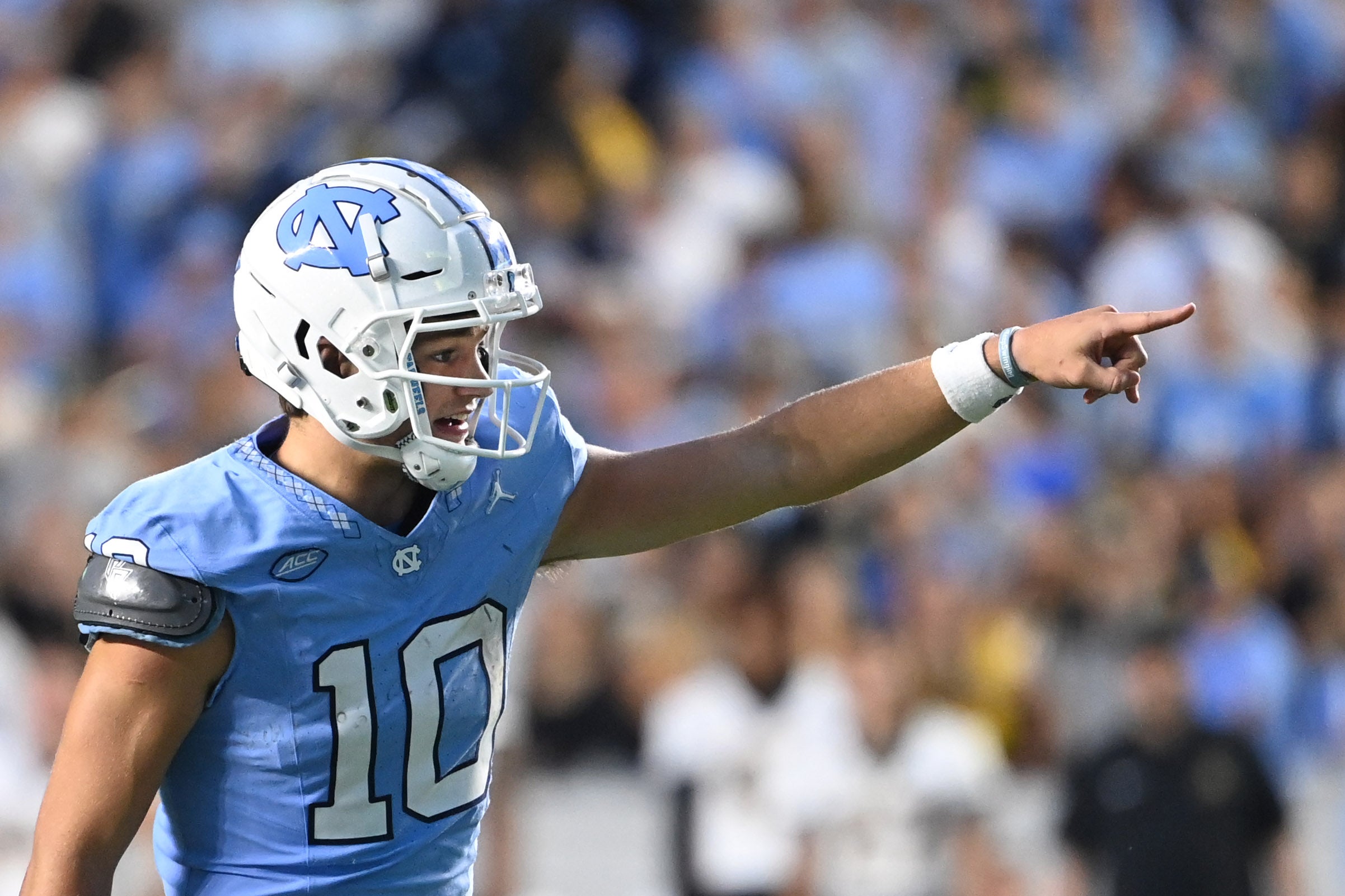 Sep 9, 2023; Chapel Hill, North Carolina, USA; North Carolina Tar Heels quarterback Drake Maye (10) points in the third quarter at Kenan Memorial Stadium.