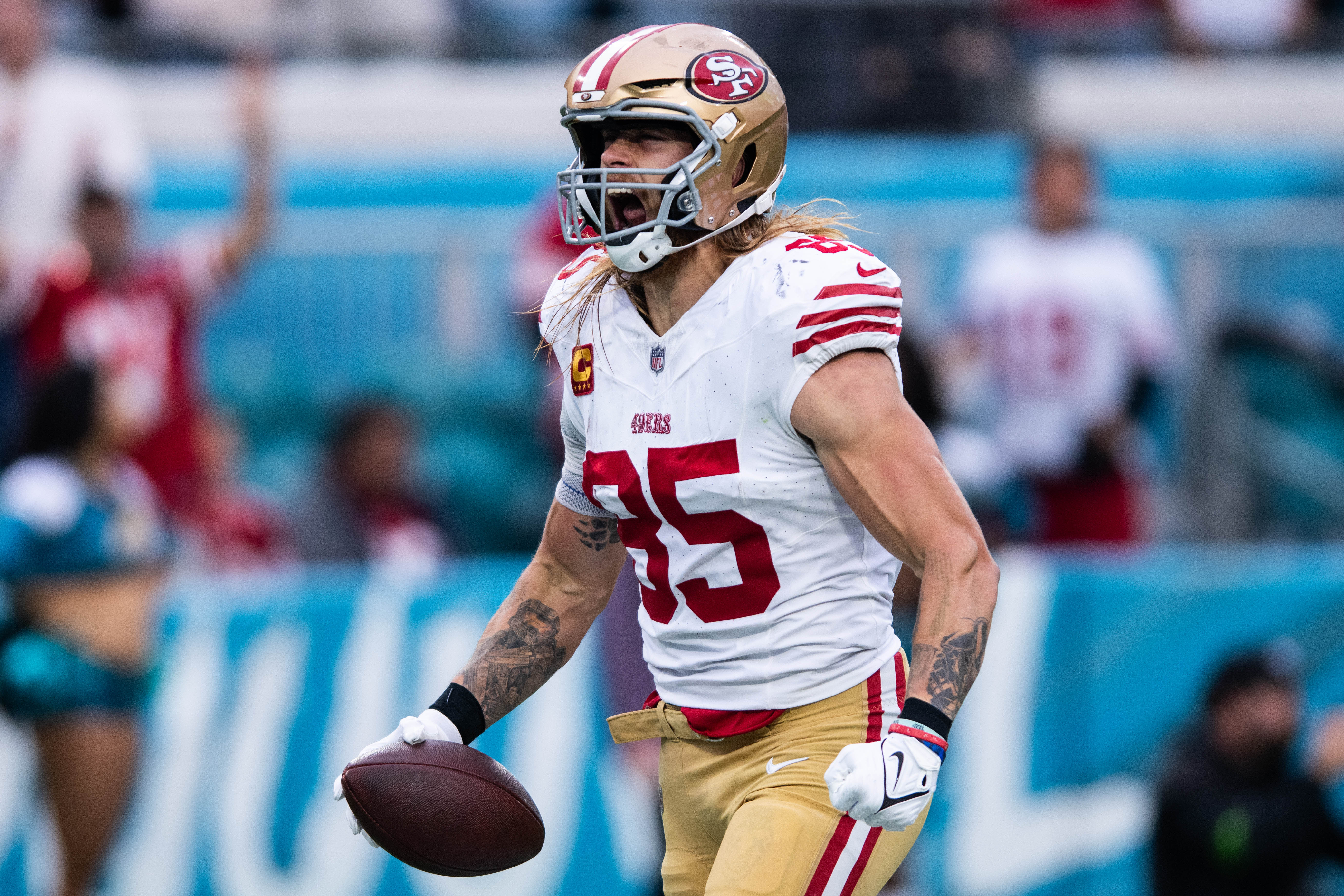 Nov 12, 2023; Jacksonville, Florida, USA; San Fransisco 49ers tight end George Kittle (85) celebrates a touchdown against the Jacksonville Jaguars in the third quarter at EverBank Stadium.