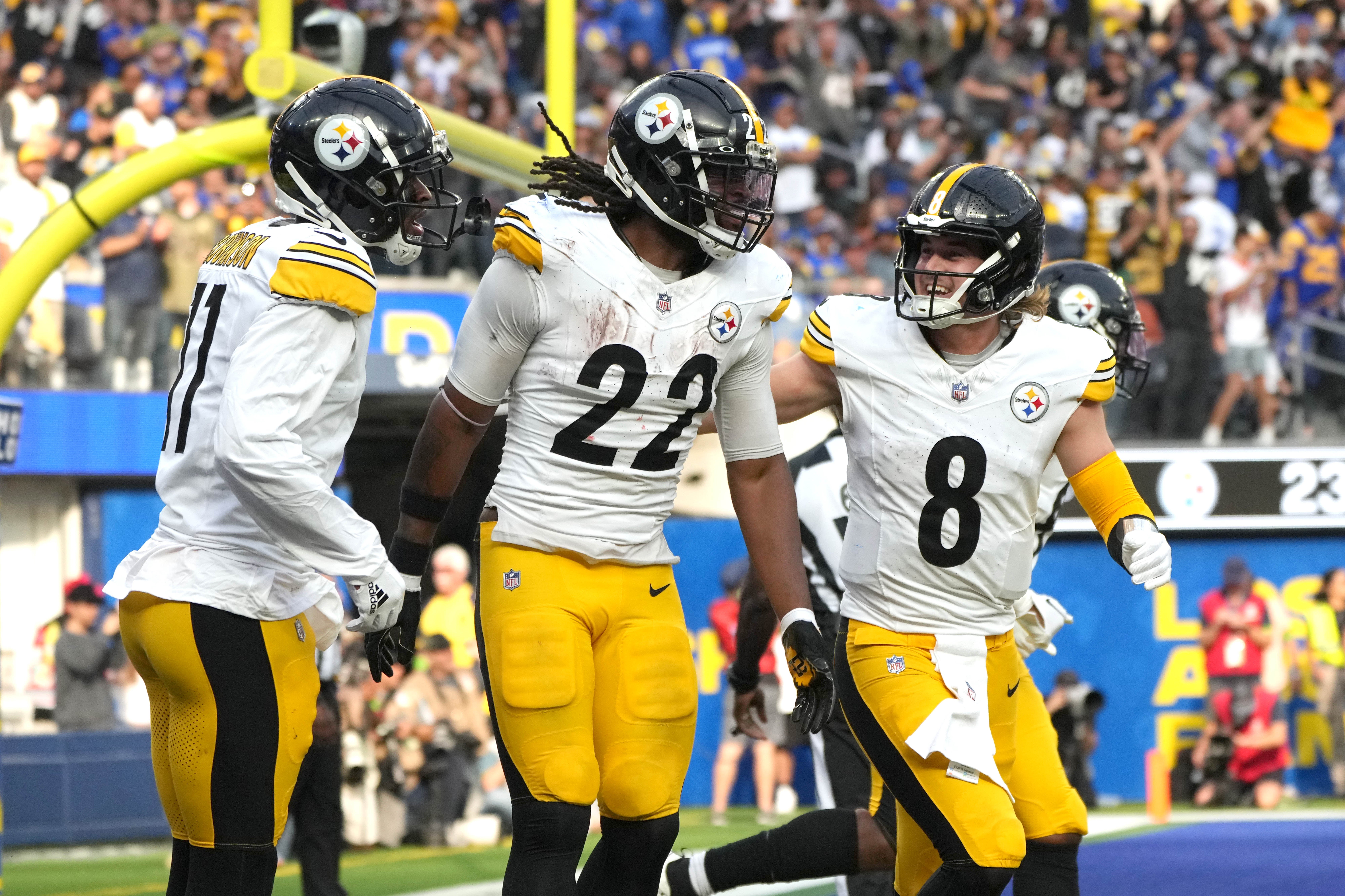 Oct 22, 2023; Inglewood, California, USA; Pittsburgh Steelers running back Najee Harris (22) celebrates with wide receiver Allen Robinson II (11) and quarterback Kenny Pickett (8) after scoring on a 3-yard touchdown run against the Los Angeles Rams in the second half at SoFi Stadium. Mandatory Credit: Kirby Lee-USA TODAY Sports