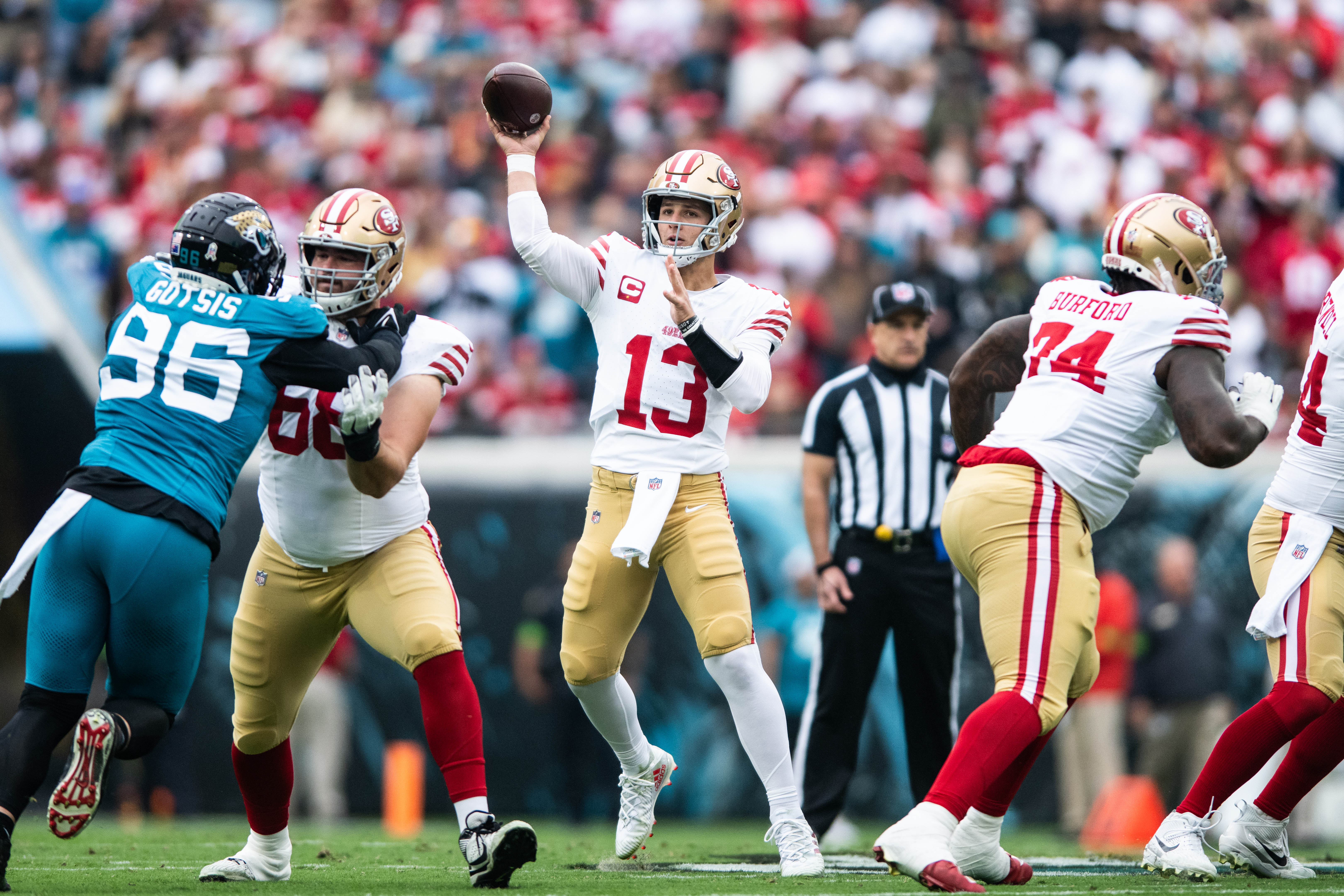 Nov 12, 2023; Jacksonville, Florida, USA; San Fransisco 49ers quarterback Brock Purdy (13) throws the ball against the Jacksonville Jaguars in the first quarter at EverBank Stadium.