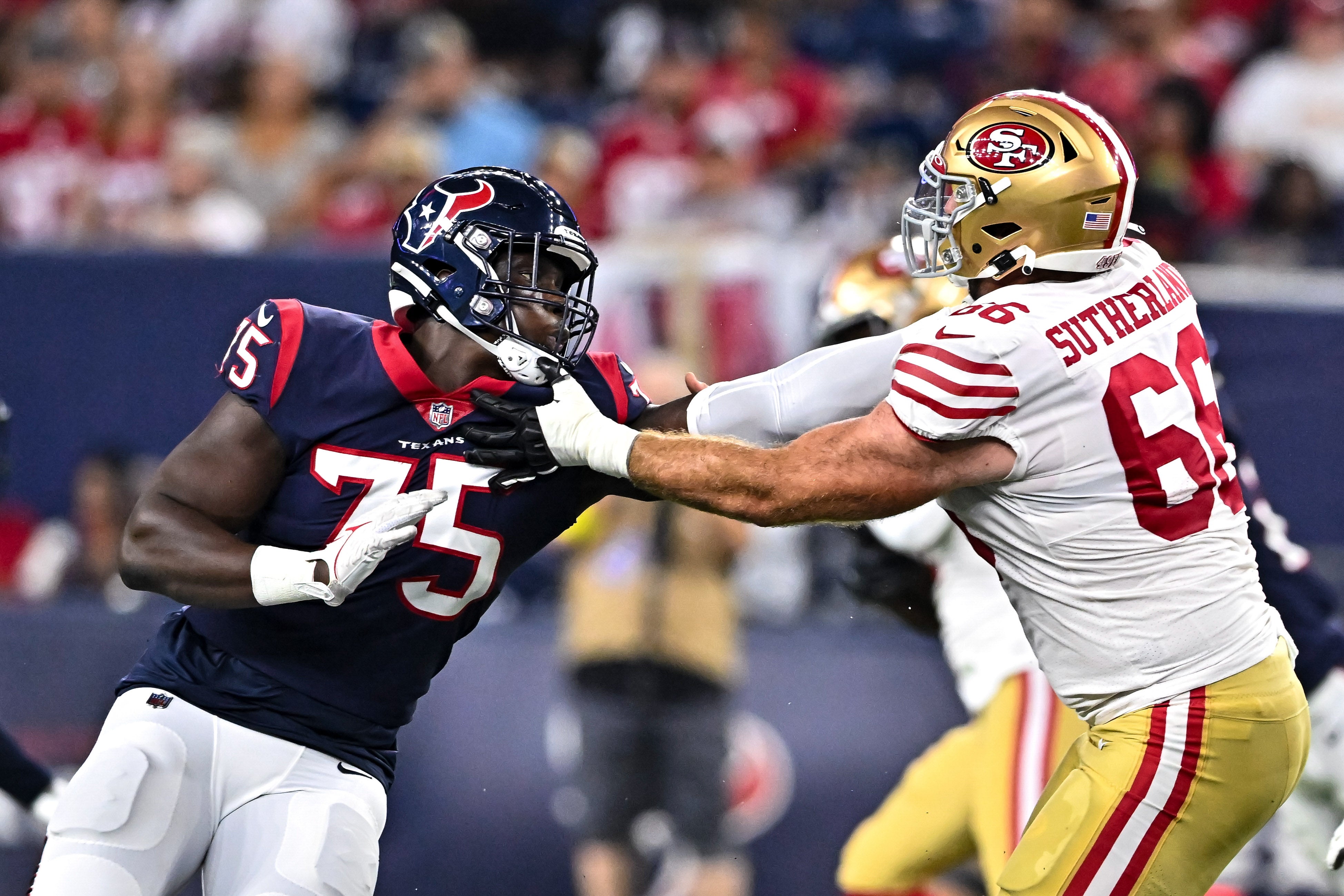 Aug 25, 2022; Houston, Texas, USA; Houston Texans defensive end Adedayo Odeleye (75) and San Francisco 49ers guard Keaton Sutherland (66) in action during the second half at NRG Stadium.