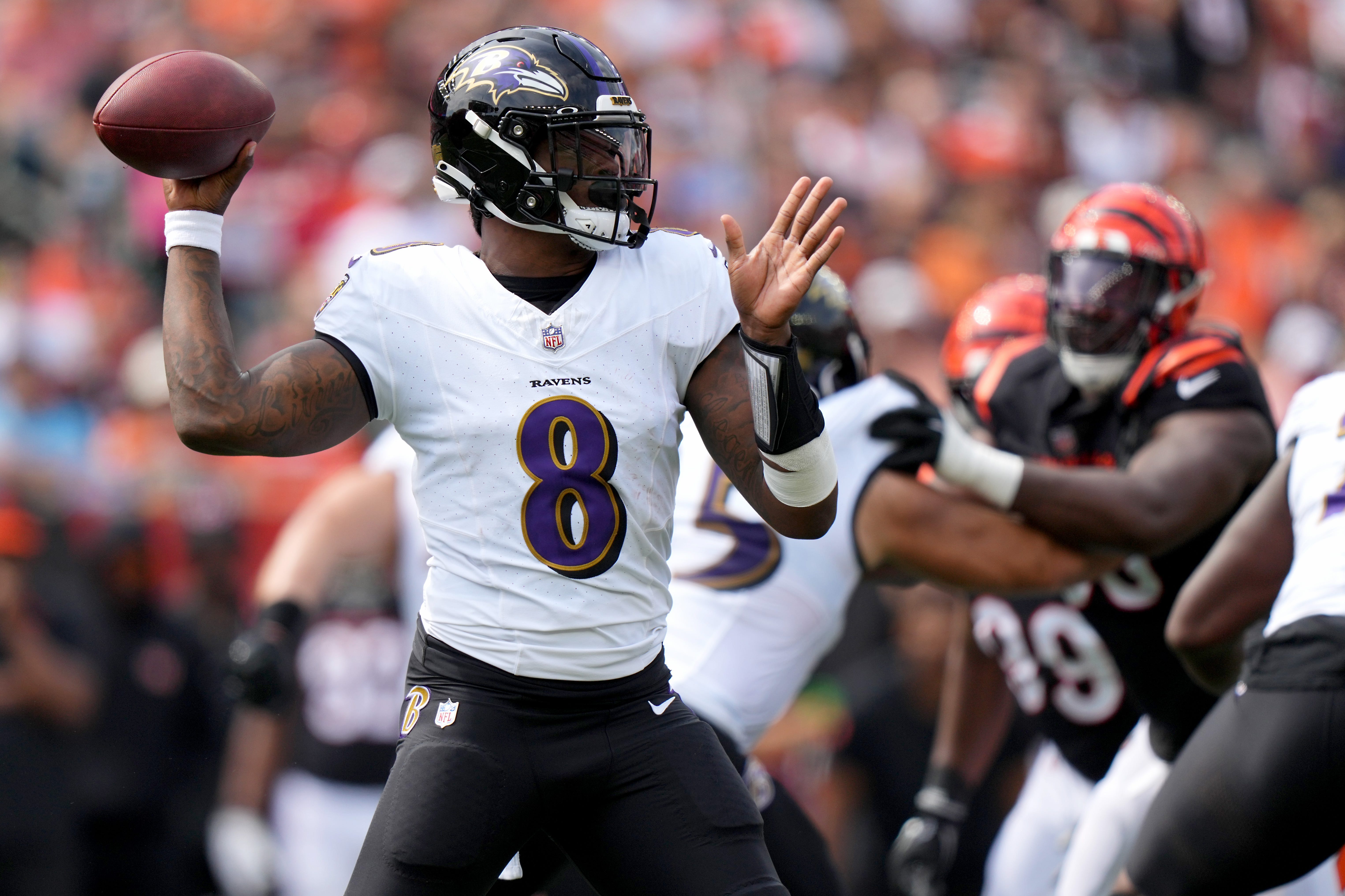 Baltimore Ravens quarterback Lamar Jackson (8) throws in the first quarter of a Week 2 NFL football game between the Baltimore Ravens and the Cincinnati Bengals Sunday, Sept. 17, 2023, at Paycor Stadium in Cincinnati.