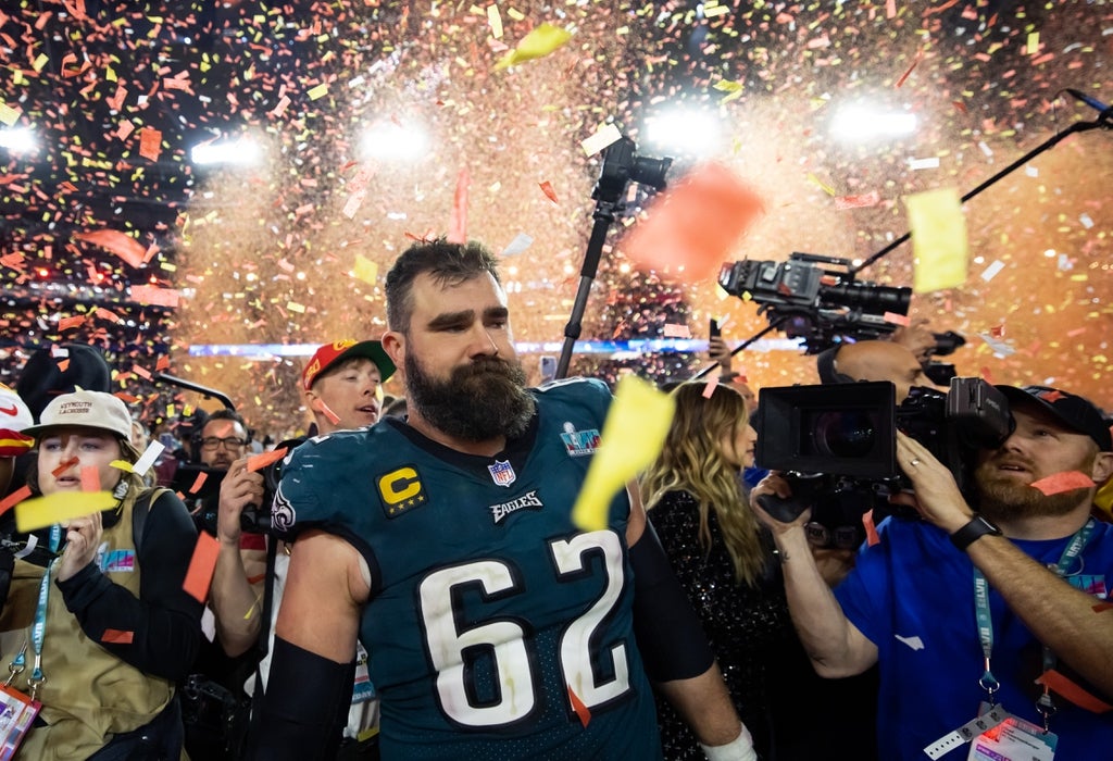 Confetti falls as Philadelphia Eagles center Jason Kelce reacts after losing to the Kansas City Chiefs during Super Bowl LVII at State Farm Stadium.