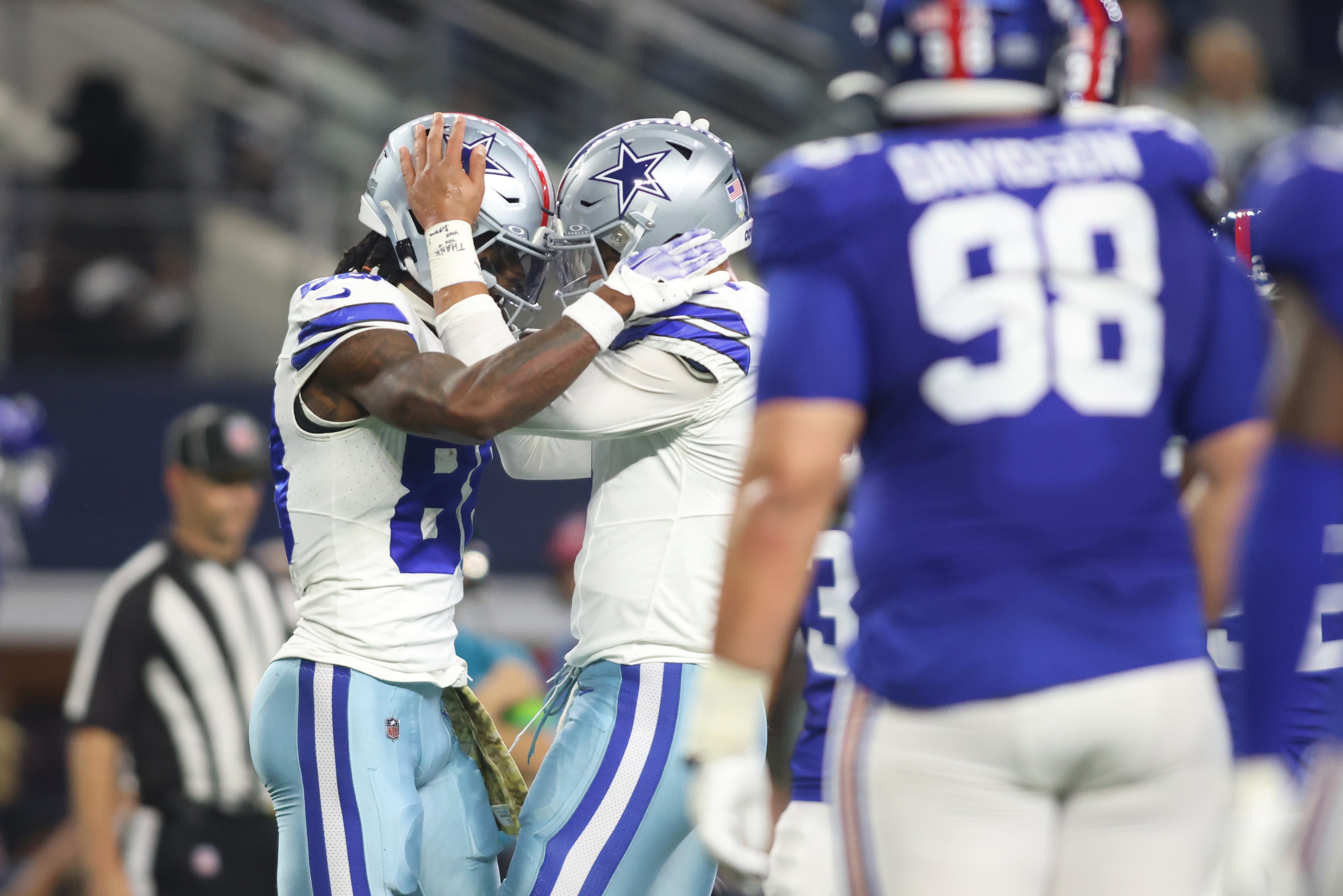 CeeDee Lamb and Dak Prescott celebrate after a touchdown vs the Giants