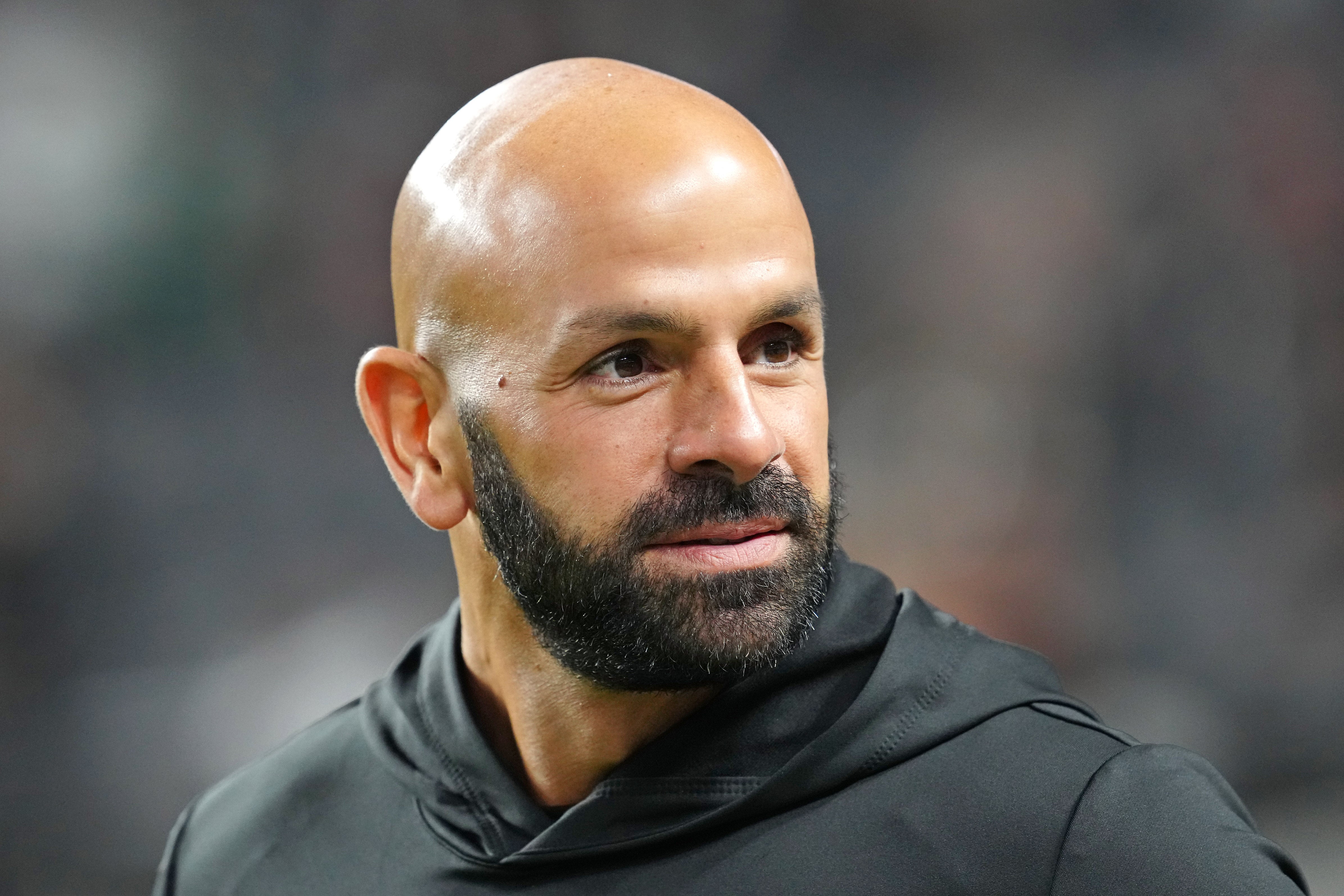 New York Jets head coach Robert Saleh takes the field before the start of a game against the Las Vegas Raiders at Allegiant Stadium.