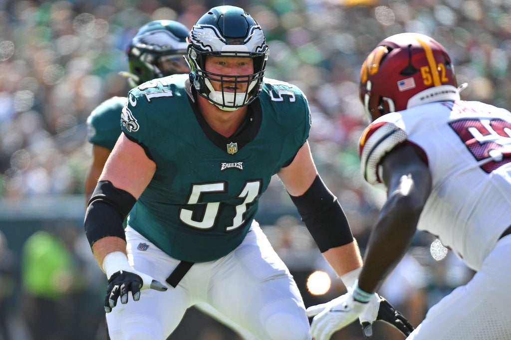 Philadelphia Eagles center Cam Jurgens blocks against the Washington Commanders at Lincoln Financial Field.