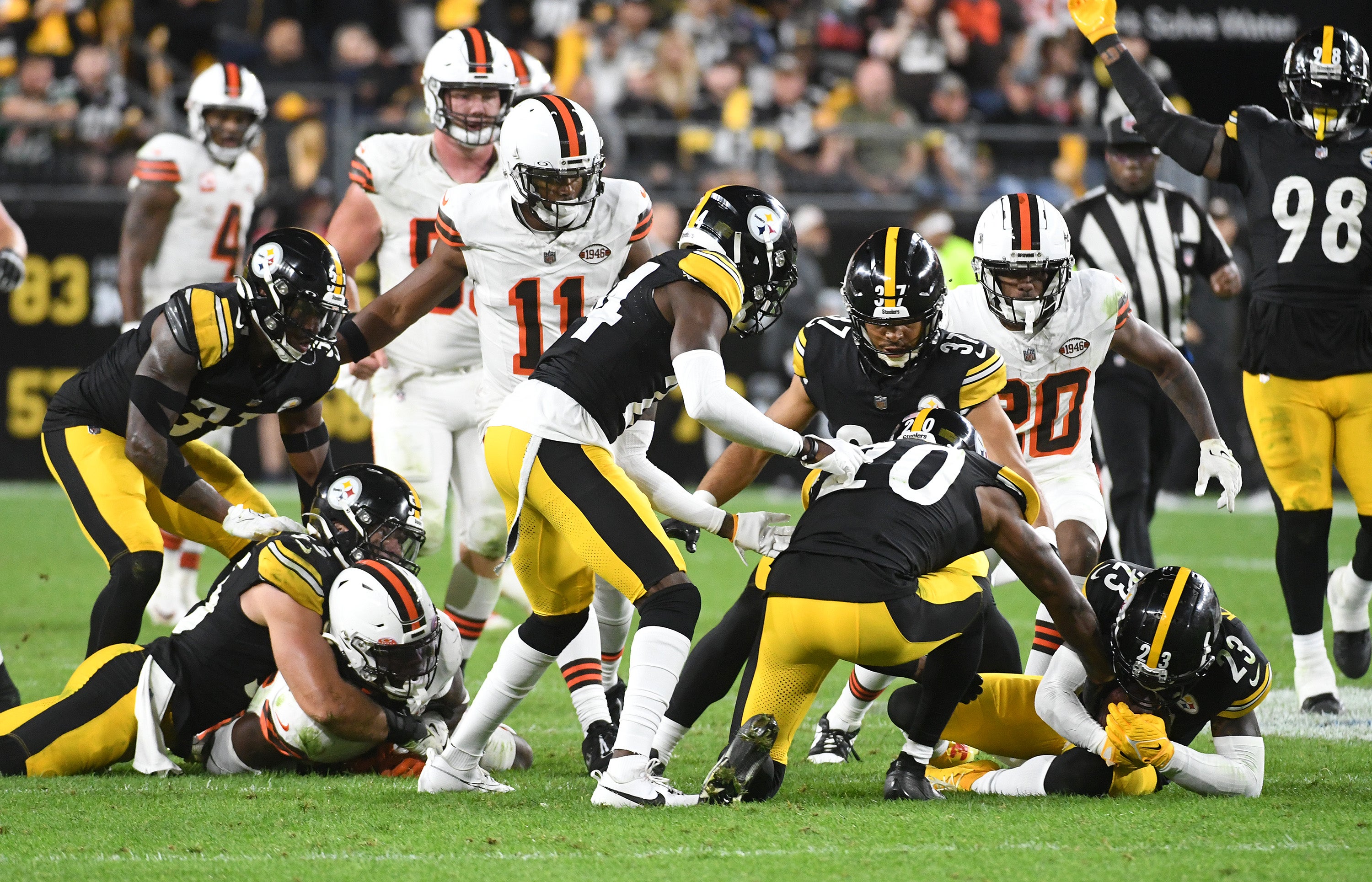 Sep 18, 2023; Pittsburgh, Pennsylvania, USA; Pittsburgh Steelers safety Damontae Kazee (23) recovers a fumble against the Cleveland Browns during the fourth quarter at Acrisure Stadium. Mandatory Credit: Philip G. Pavely-USA TODAY Sports