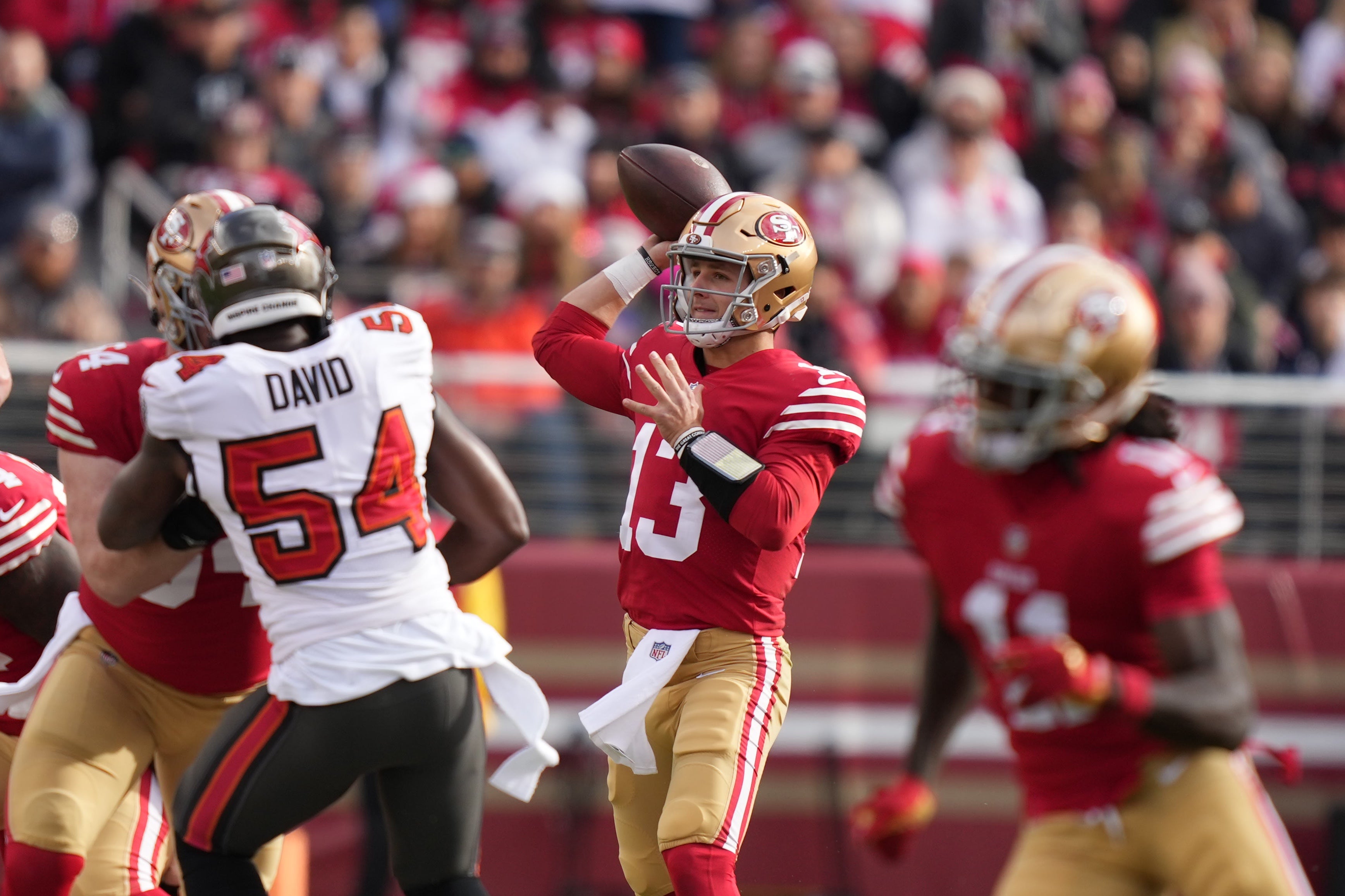 December 11, 2022; Santa Clara, California, USA; San Francisco 49ers quarterback Brock Purdy (13) passes the football against the Tampa Bay Buccaneers during the first quarter at Levi's Stadium.