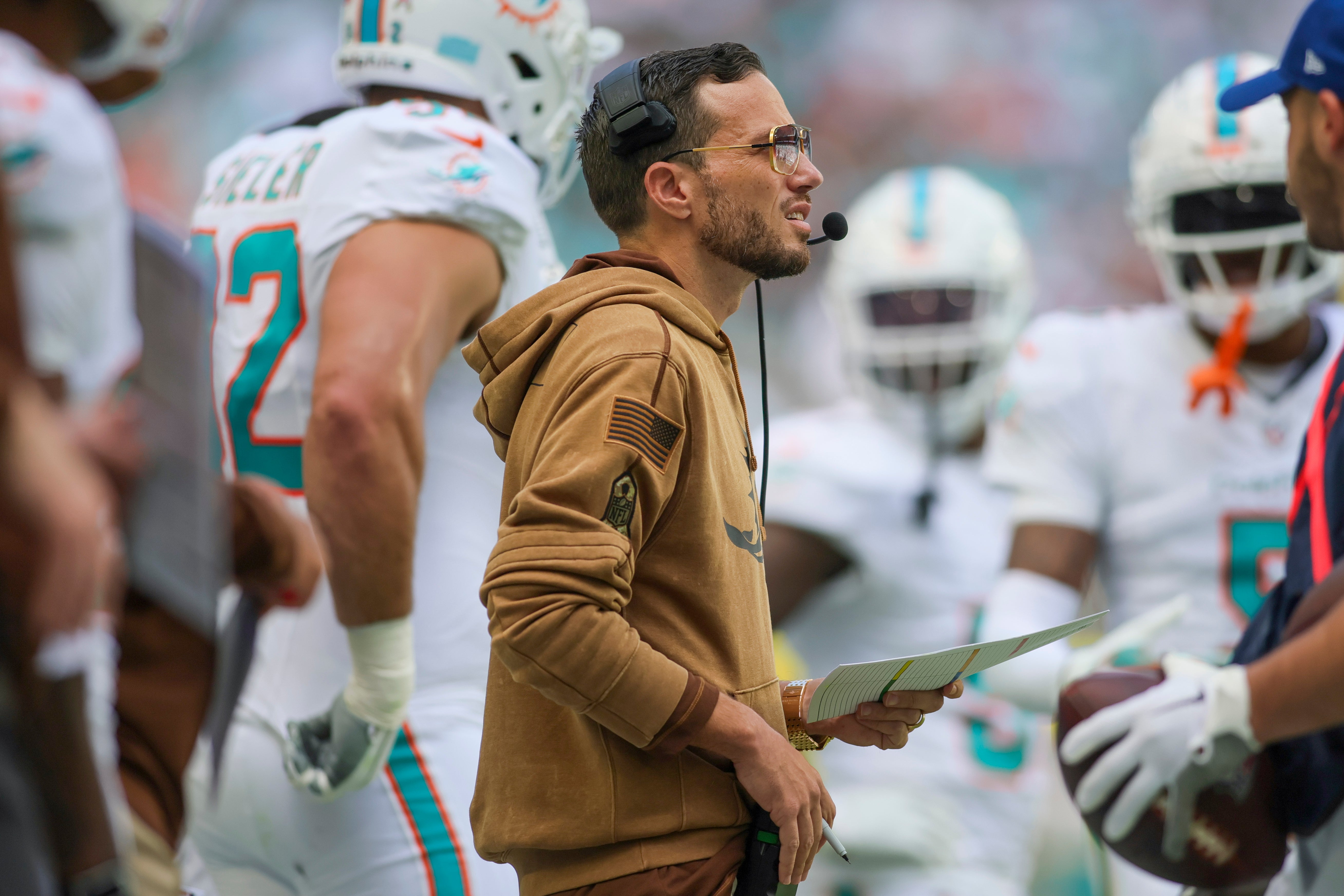 Nov 19, 2023; Miami Gardens, Florida, USA; Miami Dolphins head coach Mike McDaniel look on from the sideline against the Las Vegas Raiders during the first quarter at Hard Rock Stadium. Mandatory Credit: Sam Navarro-USA TODAY Sports