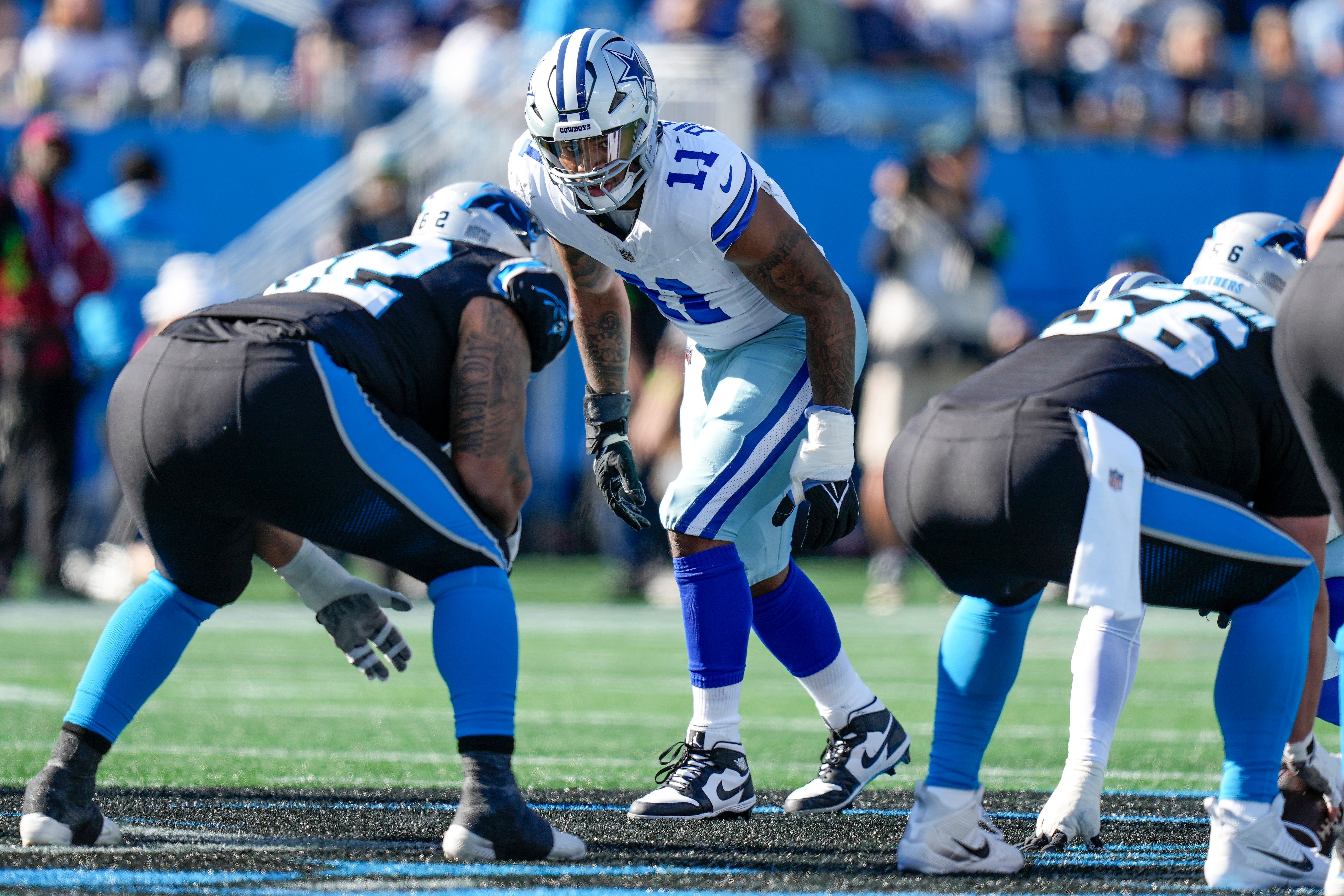 Dallas Cowboys linebacker Micah Parsons (11) in his stance against the Carolina Panthers during the first quarter at Bank of America Stadium.