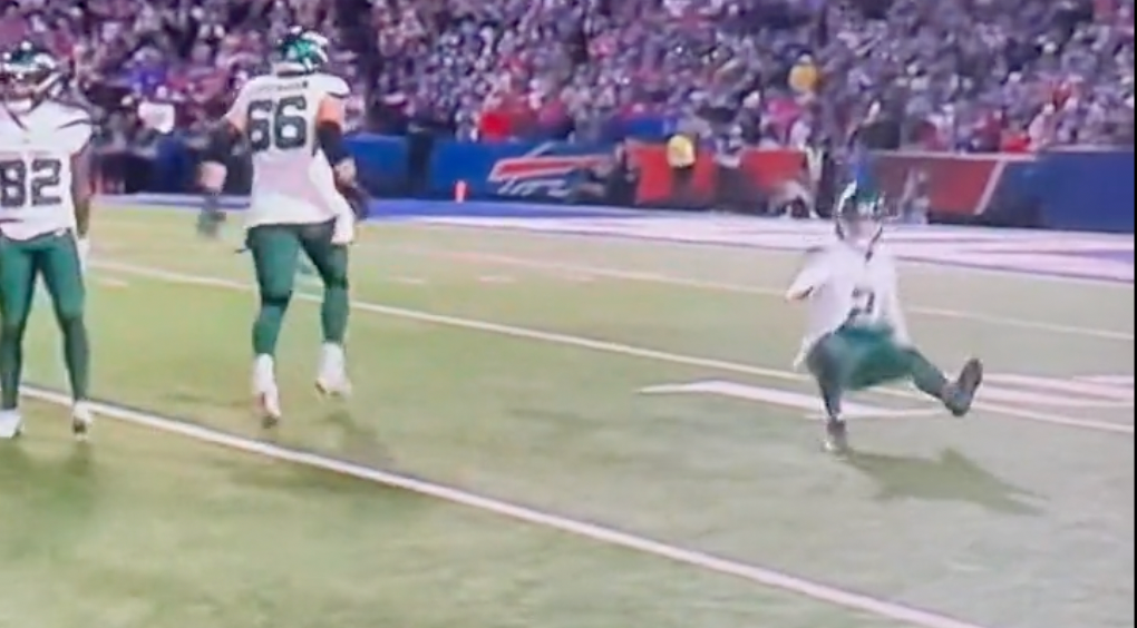 Zach Wilson falls during the Jets Week 11 matchup against the Buffalo Bills