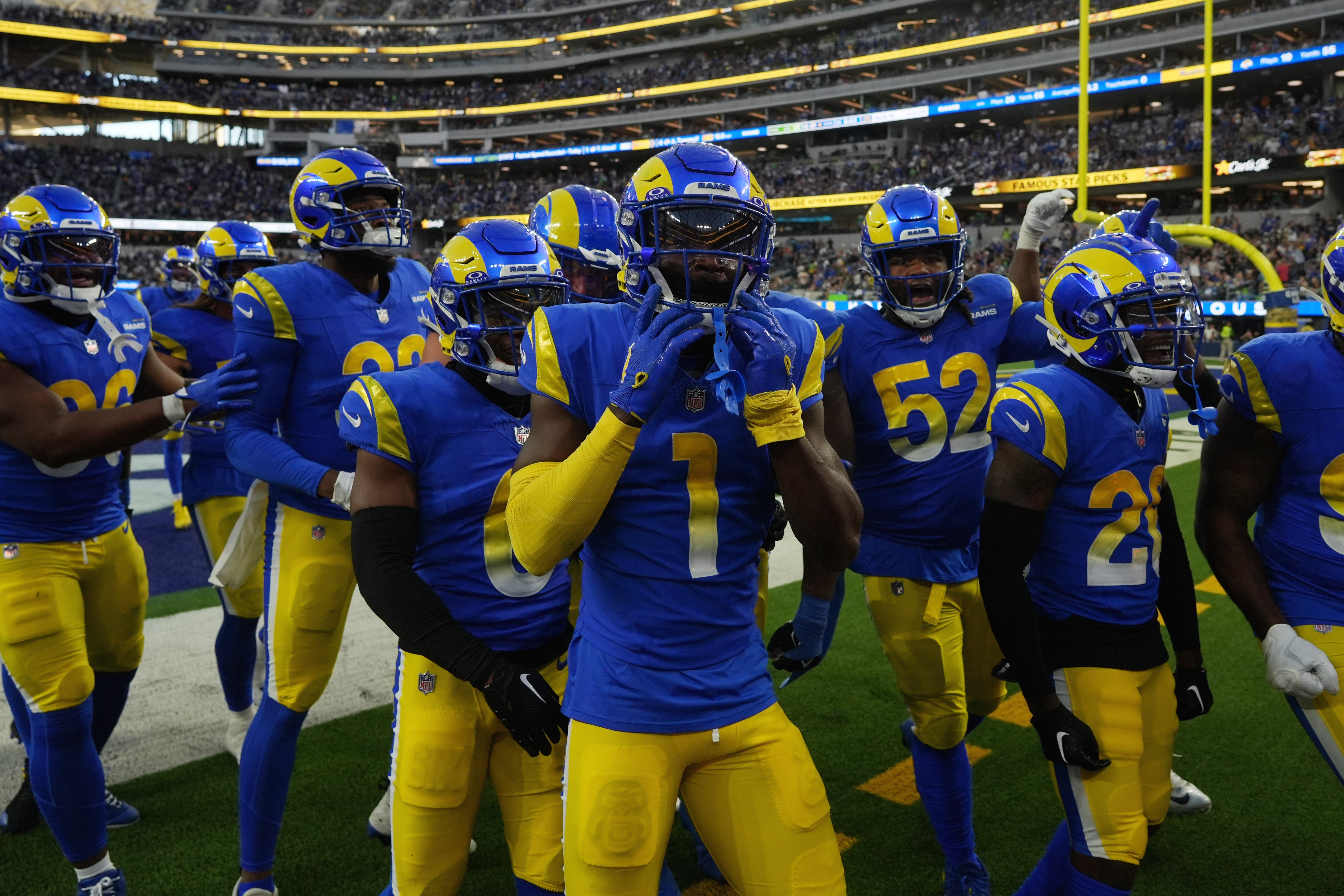 Nov 19, 2023; Inglewood, California, USA; Los Angeles Rams cornerback Derion Kendrick (1) celebrates with teammates after defeating the Seattle Seahawks at SoFi Stadium.