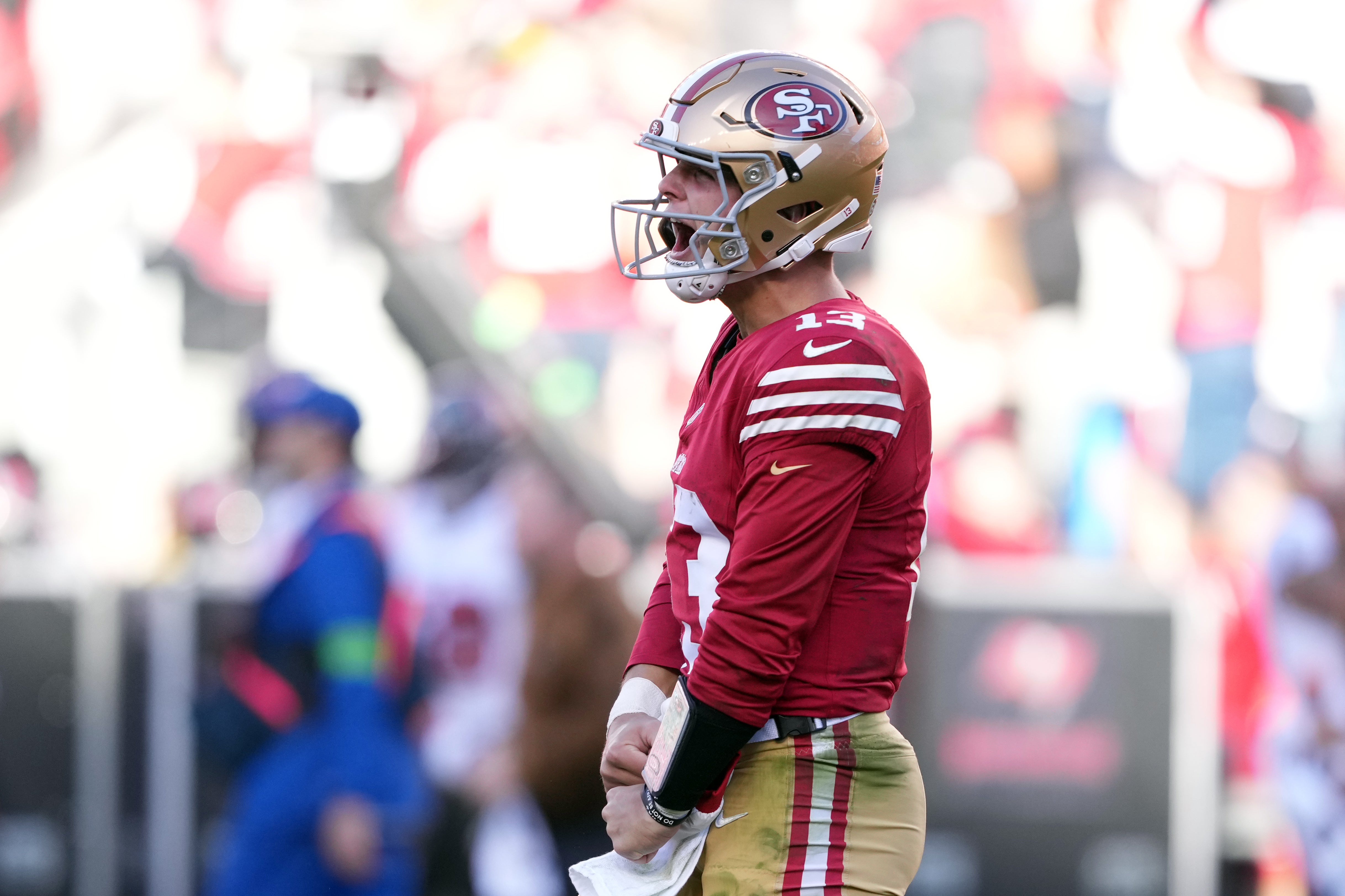 Nov 19, 2023; Santa Clara, California, USA; San Francisco 49ers quarterback Brock Purdy (13) reacts after throwing a touchdown pass during the third quarter against the Tampa Bay Buccaneers at Levi's Stadium.