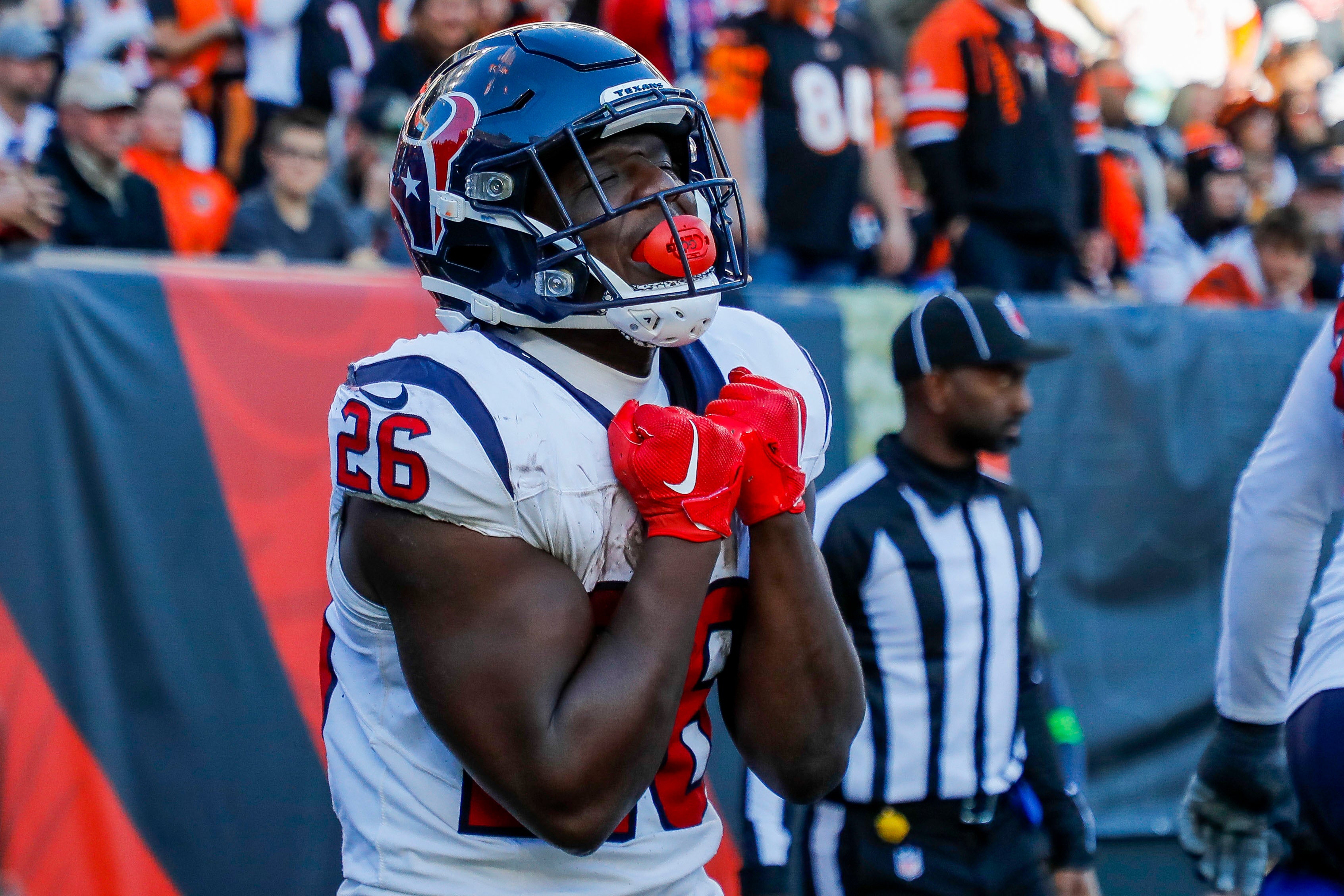 Nov 12, 2023; Cincinnati, Ohio, USA; Houston Texans running back Devin Singletary (26) reacts after scoring a touchdown against the Cincinnati Bengals in the second half at Paycor Stadium.