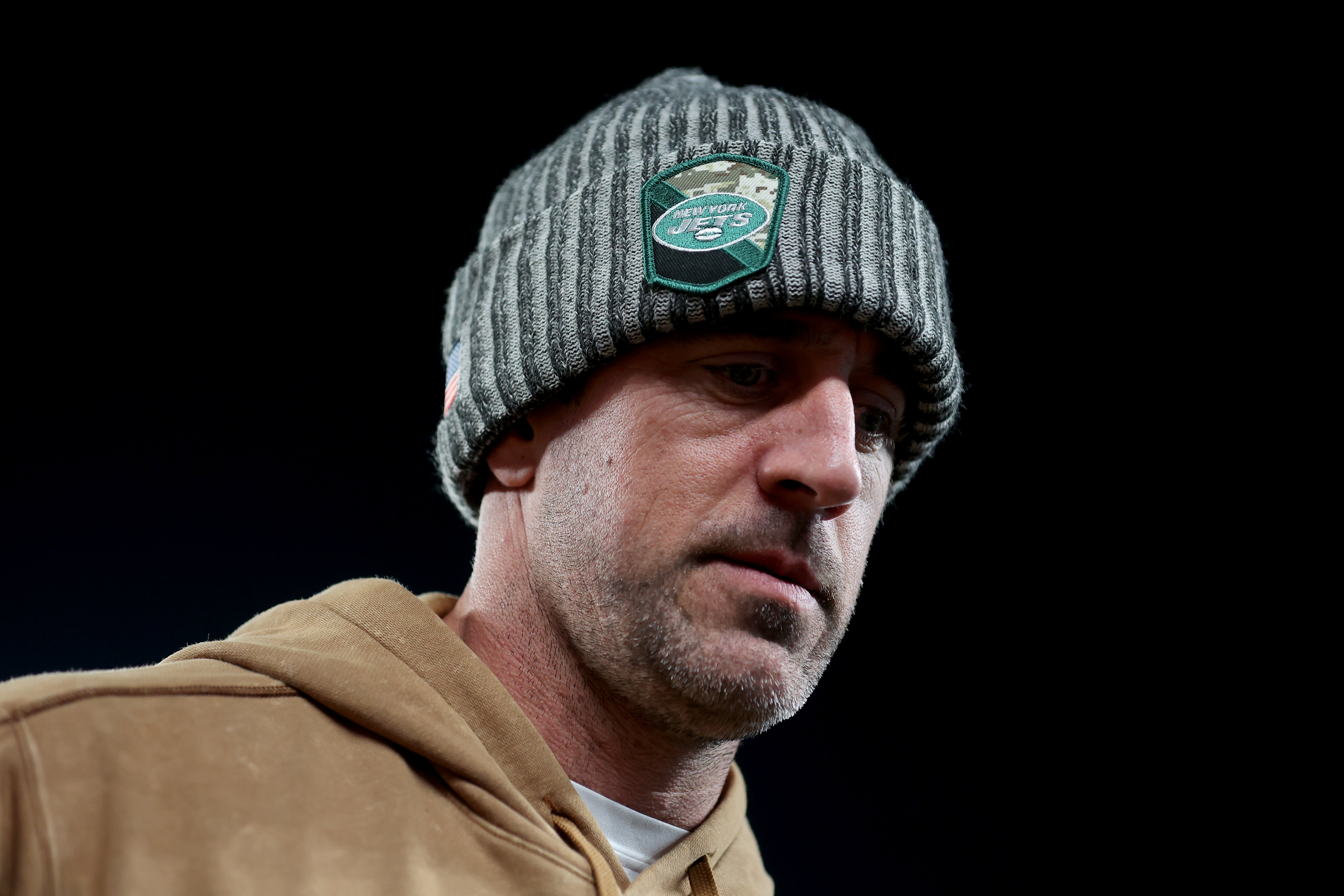 Nov 6, 2023; East Rutherford, New Jersey, USA; New York Jets injured quarterback Aaron Rodgers leaves the field after losing to the Los Angeles Chargers at MetLife Stadium.