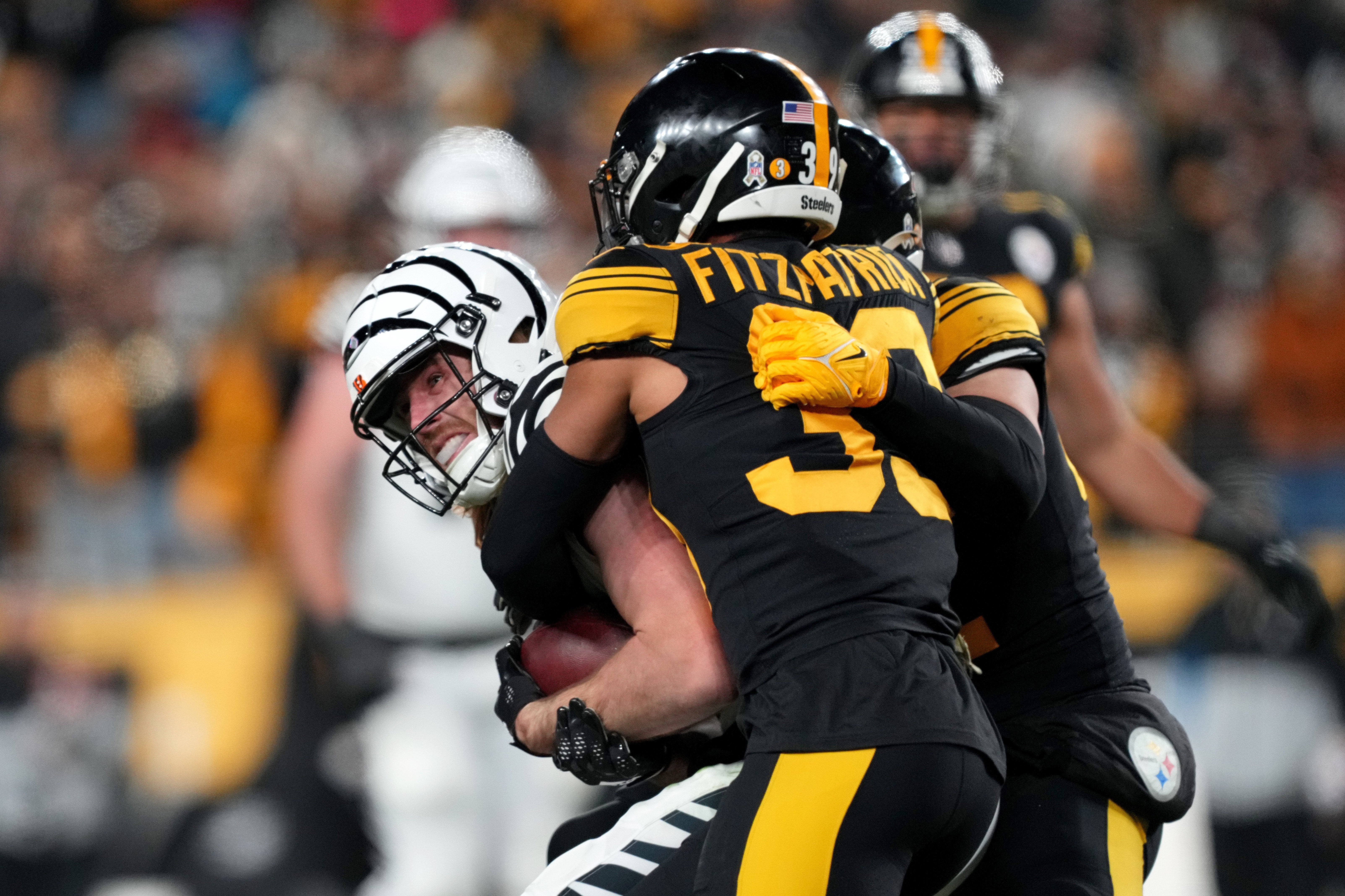 Nov 20, 2022; Pittsburgh, Pennsylvania, USA; Cincinnati Bengals wide receiver Trenton Irwin (16) is tackled by Pittsburgh Steelers safety Minkah Fitzpatrick (39) in the third quart at Acrisure Stadium. Mandatory Credit: Kareem Elgazzar-USA TODAY Sports-The Cincinnati Enquirer  