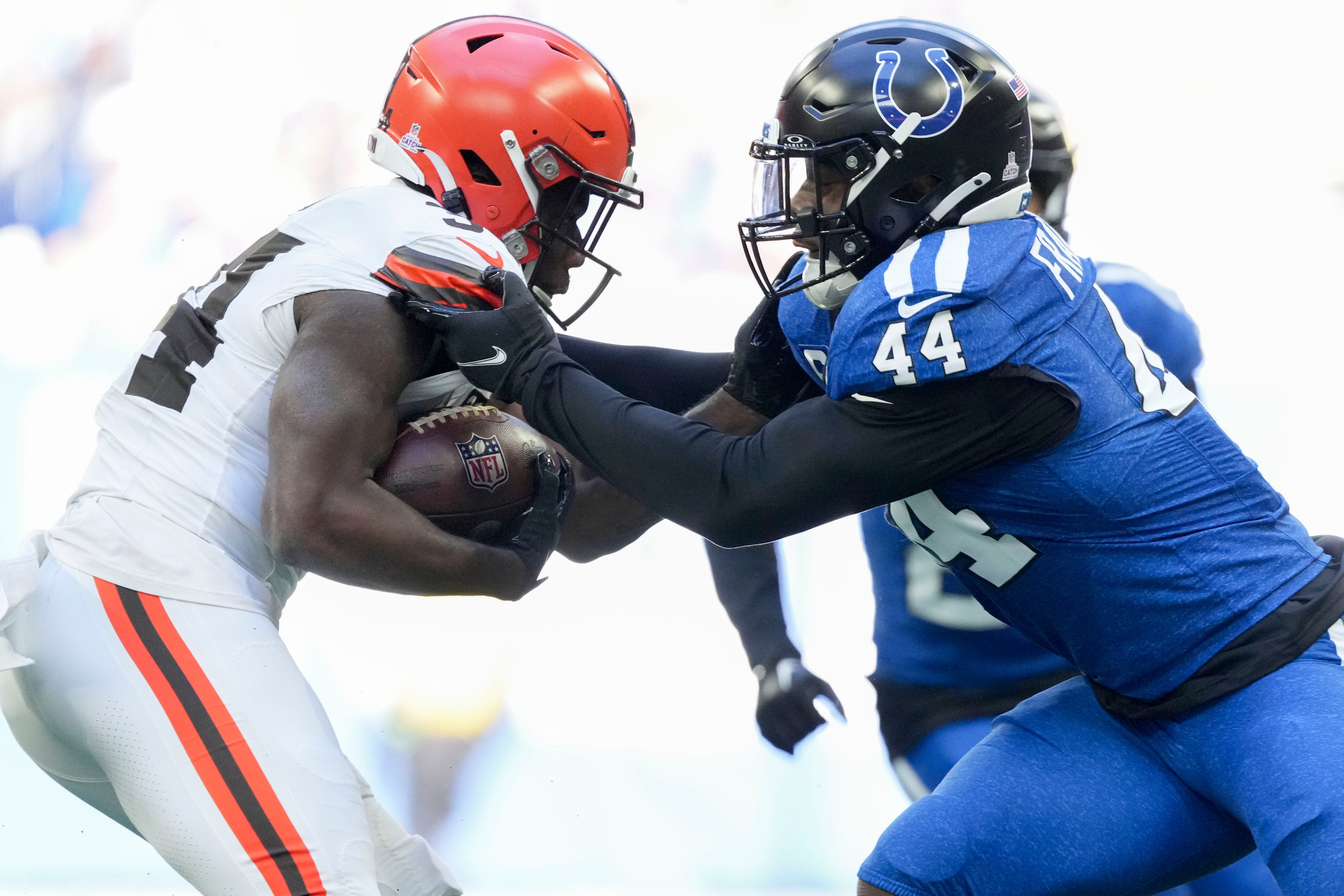 Oct 22, 2023; Indianapolis, Indiana, USA; Indianapolis Colts linebacker Zaire Franklin (44) works to stop Cleveland Browns running back Jerome Ford (34) on during a game against the Cleveland Browns at Lucas Oil Stadium.