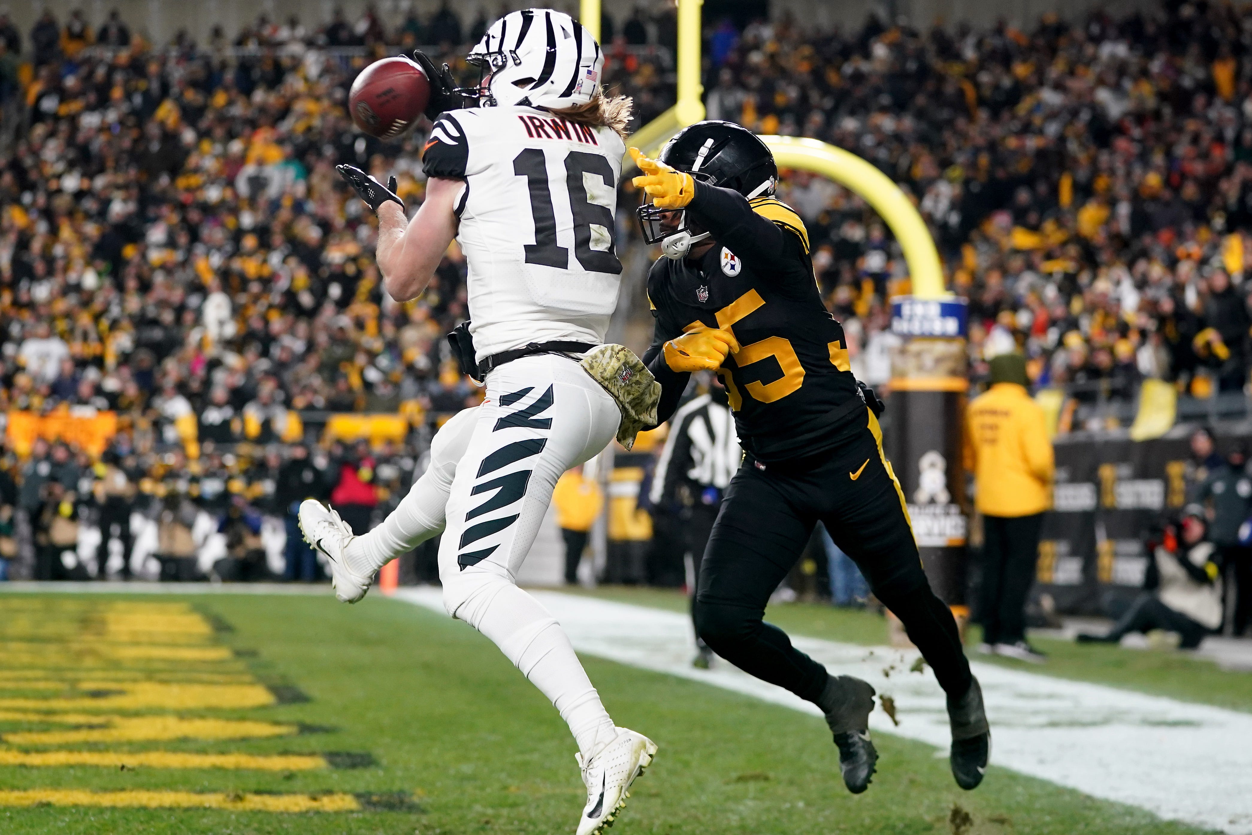 Cincinnati Bengals wide receiver Trenton Irwin (16) catches a touchdown pass as Pittsburgh Steelers cornerback Arthur Maulet (35) defends in the third quarter during a Week 11 NFL game, Sunday, Nov. 20, 2022, at Acrisure Stadium in Pittsburgh, Pa. The Cincinnati Bengals won, 37-30. Nfl Cincinnati Bengals At Pittsburgh Steelers Nov 20 0170  