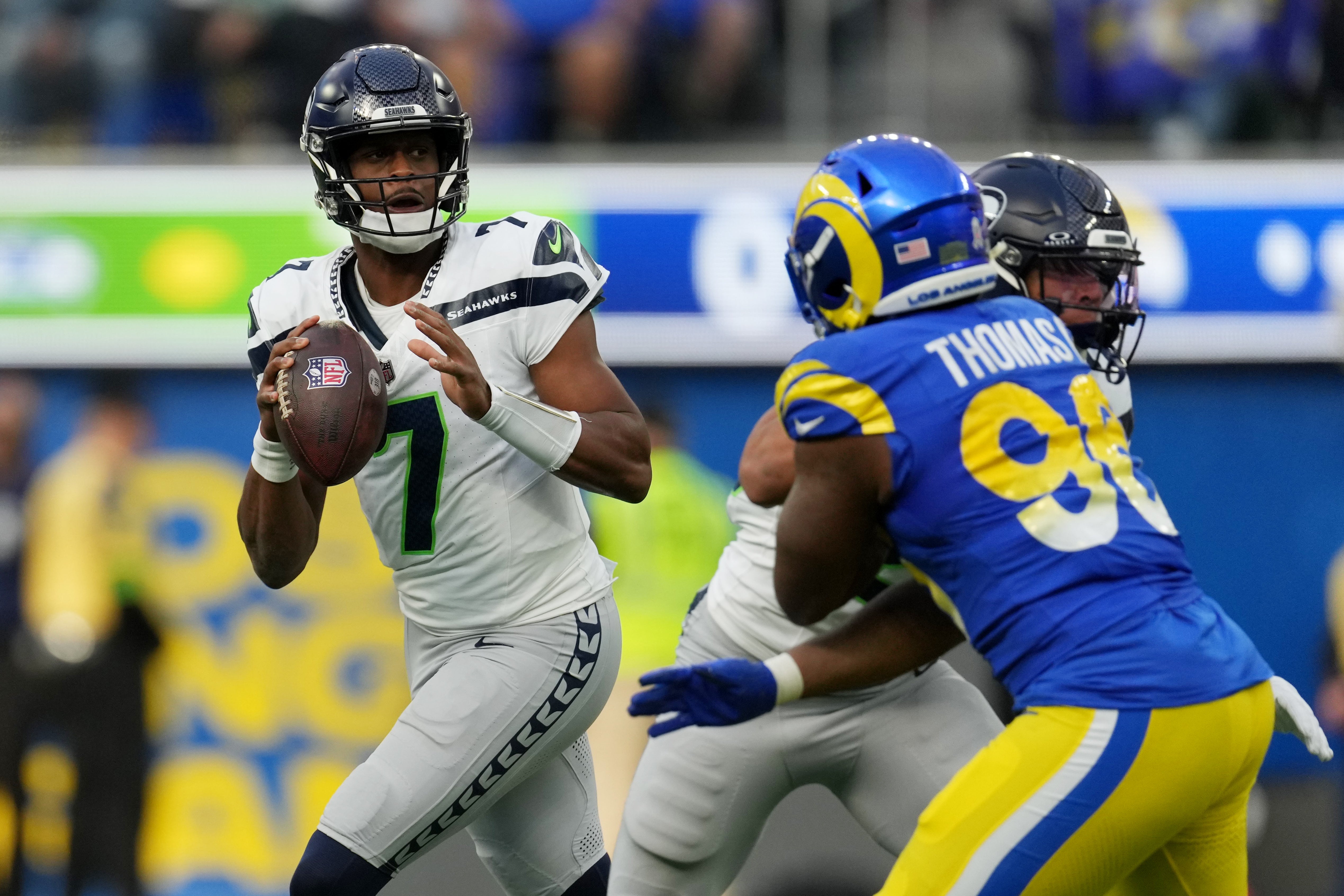 Nov 19, 2023; Inglewood, California, USA; Seattle Seahawks quarterback Geno Smith (7) looks to pass against the Los Angeles Rams in the second quarter at SoFi Stadium.