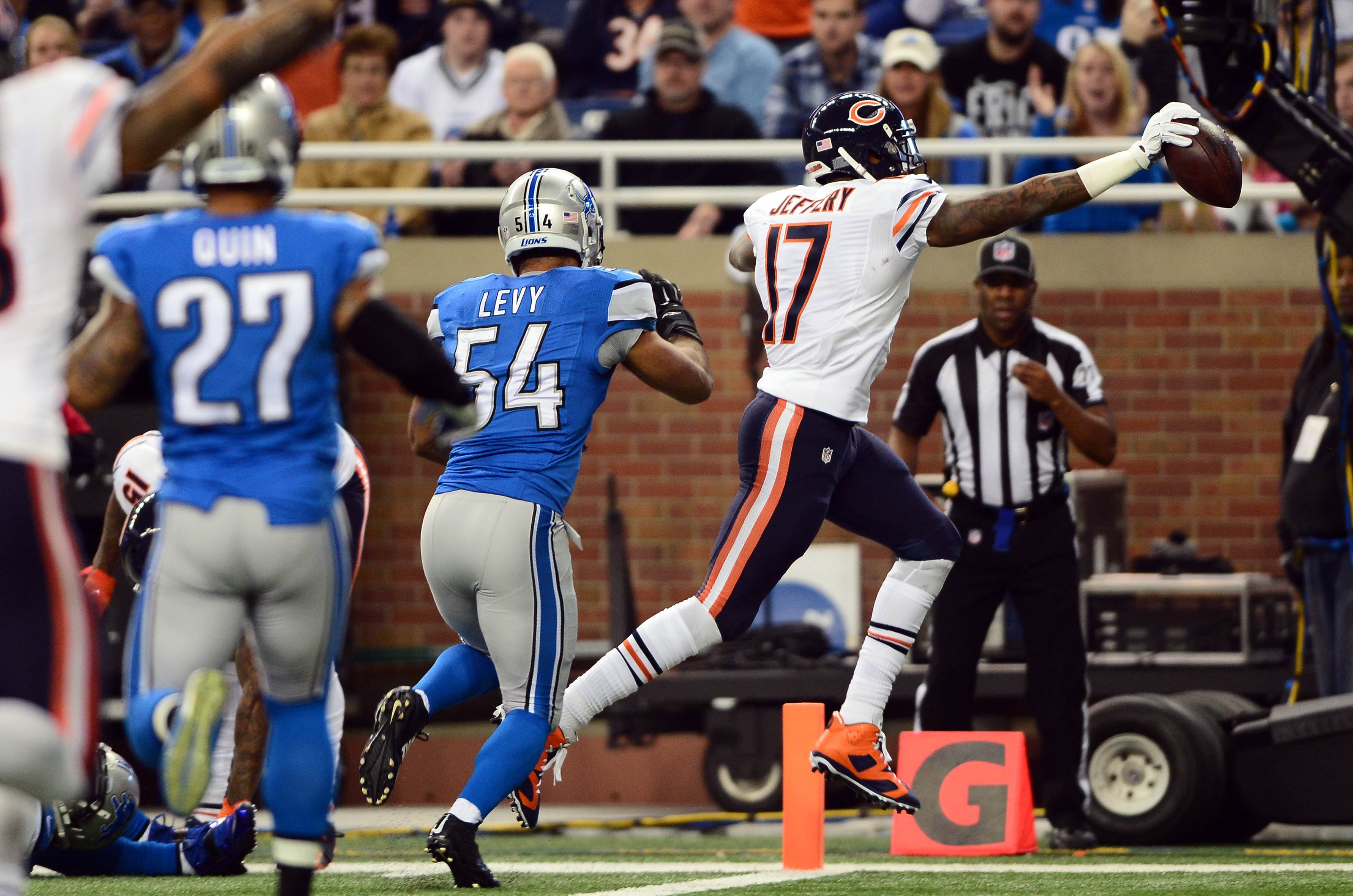 Nov 27, 2014; Detroit, MI, USA; Chicago Bears wide receiver Alshon Jeffery (17) reaches the ball into the end zone for a touchdown during the first quarter against the Detroit Lions on Thanksgiving at Ford Field.