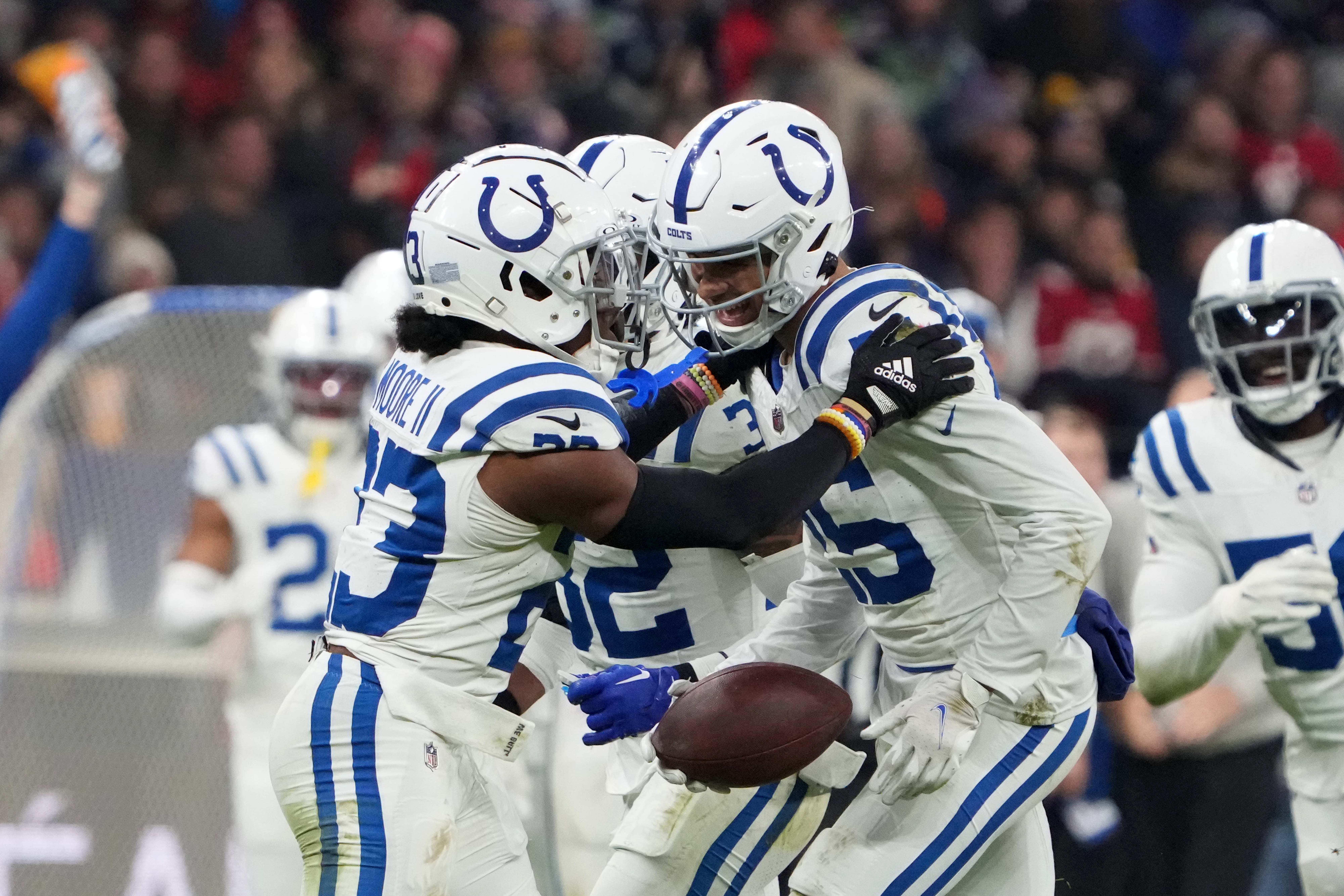 Nov 12, 2023; Frankfurt, Germany; Indianapolis Colts safety Rodney Thomas II (25) celebrates cornerback Kenny Moore II (23) after intercepting a pass against the New England Patriots in the fourth quarter during an NFL International Series game at Deutsche Bank Park.