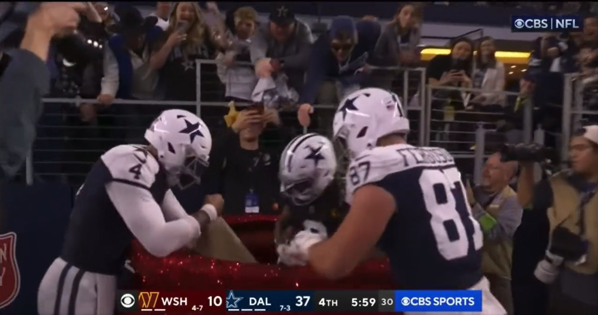Dallas Cowboys pull off epic Salvation Army red kettle celebration during Thanksgiving win over the Washington Commanders.