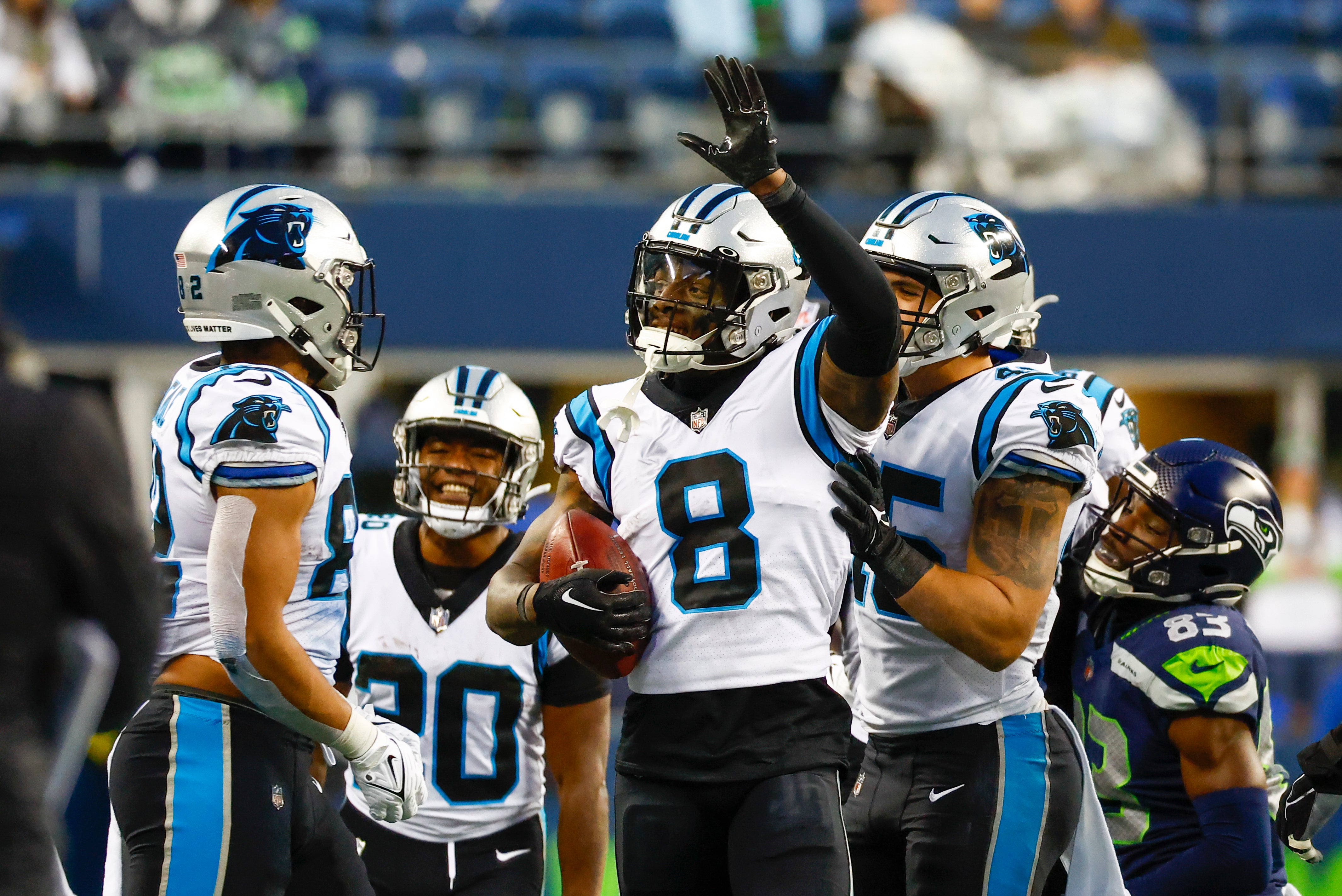Dec 11, 2022; Seattle, Washington, USA; Carolina Panthers cornerback Jaycee Horn (8) reacts after recovering an onside kick against the Seattle Seahawks at Lumen Field. Mandatory Credit: Joe Nicholson-USA TODAY Sports