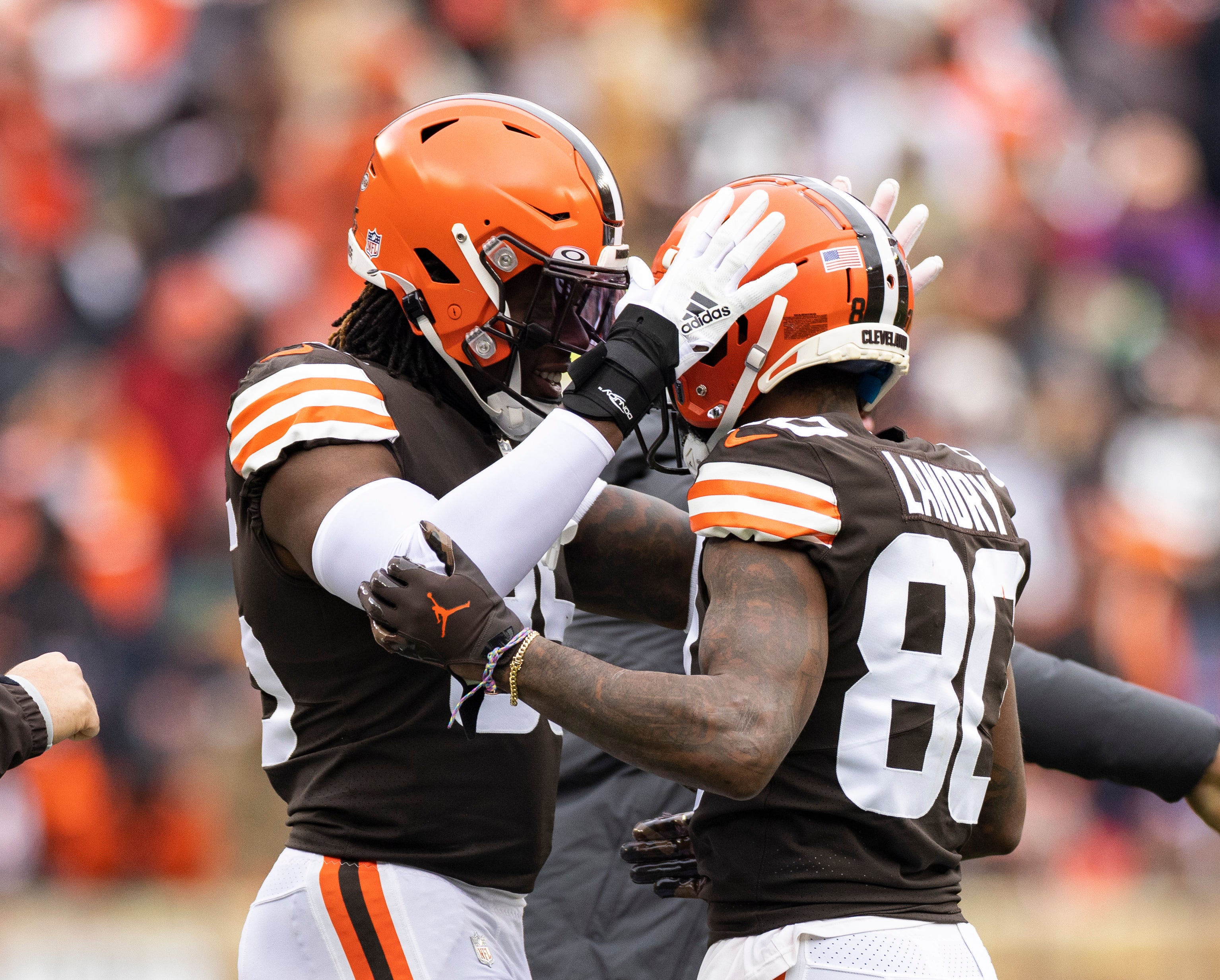 Jan 9, 2022; Cleveland, Ohio, USA; Cleveland Browns tight end David Njoku (85) congratulates wide receiver Jarvis Landry (80) on his touchdown run during the first quarter against the Cincinnati Bengals at FirstEnergy Stadium. Mandatory Credit: Scott Galvin-USA TODAY Sports