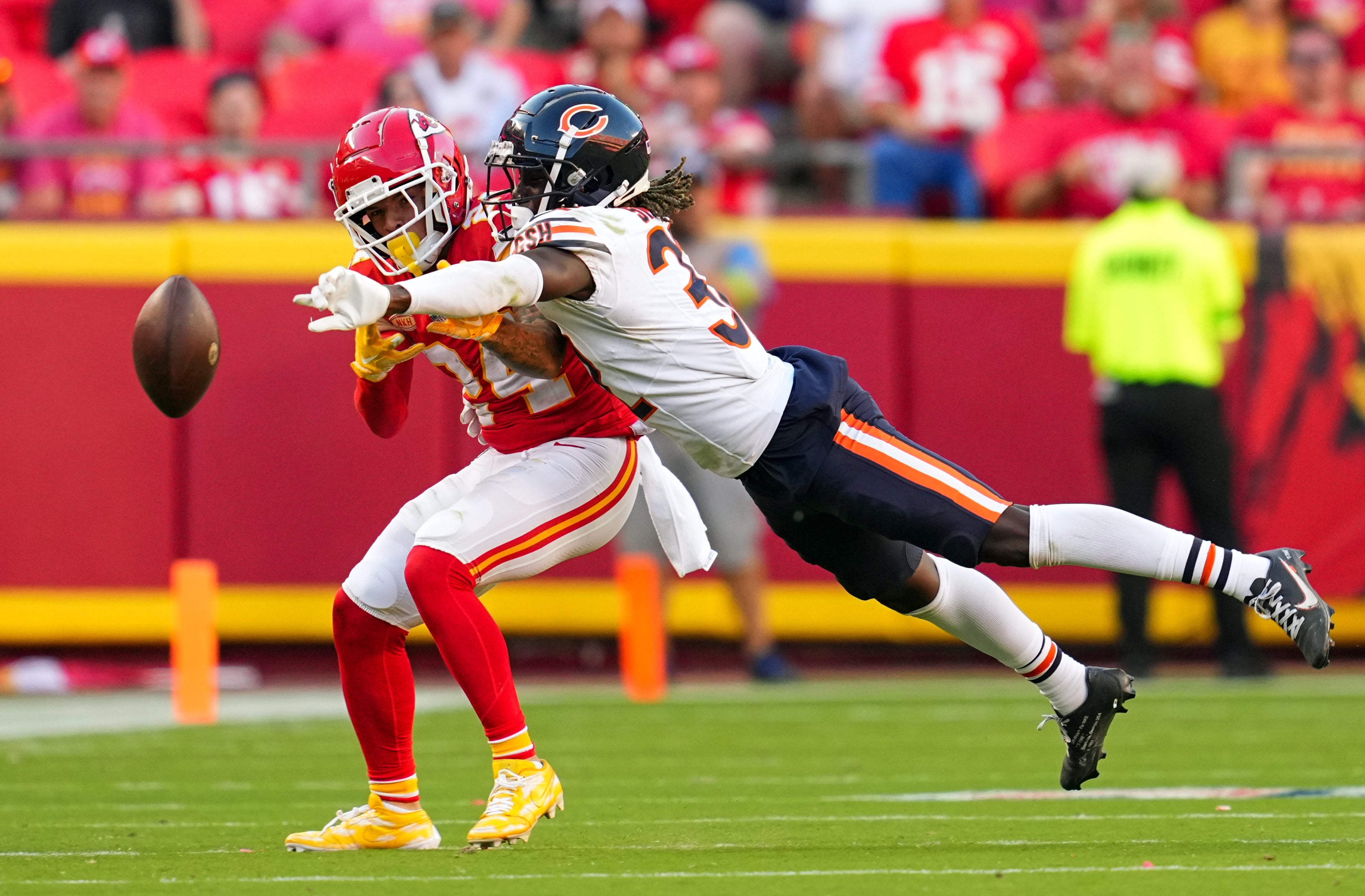 Sep 24, 2023; Kansas City, Missouri, USA; Chicago Bears cornerback Terell Smith (32) breaks up a pass intended for Kansas City Chiefs wide receiver Skyy Moore (24) during the second half at GEHA Field at Arrowhead Stadium.