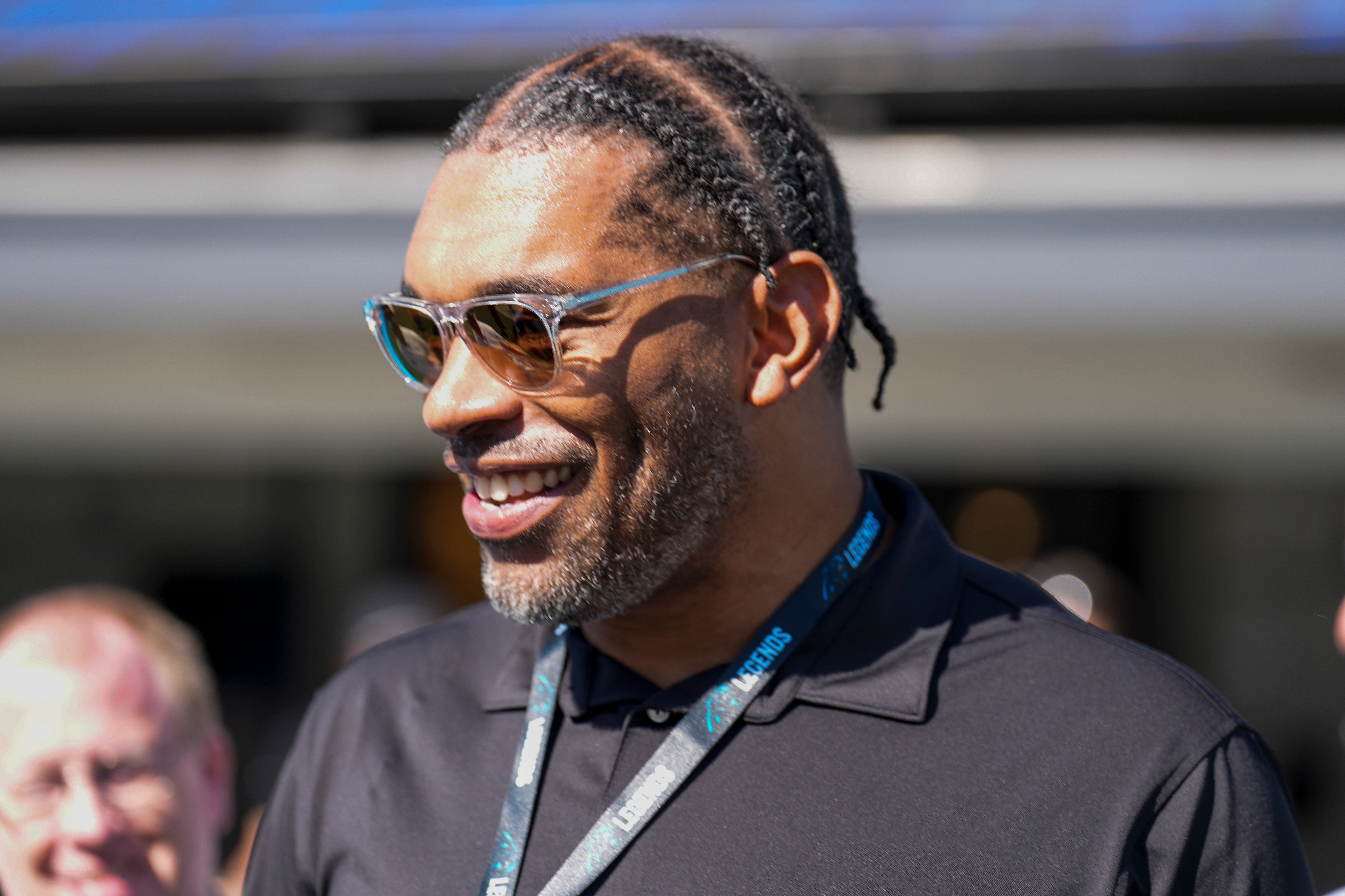 Oct 29, 2023; Charlotte, North Carolina, USA; Former Panther defensive end Julius Peppers awaits his induction into the Panthers Ring of Honor during the first quarter between the Carolina Panthers and the Houston Texans at Bank of America Stadium. Mandatory Credit: Jim Dedmon-USA TODAY Sports