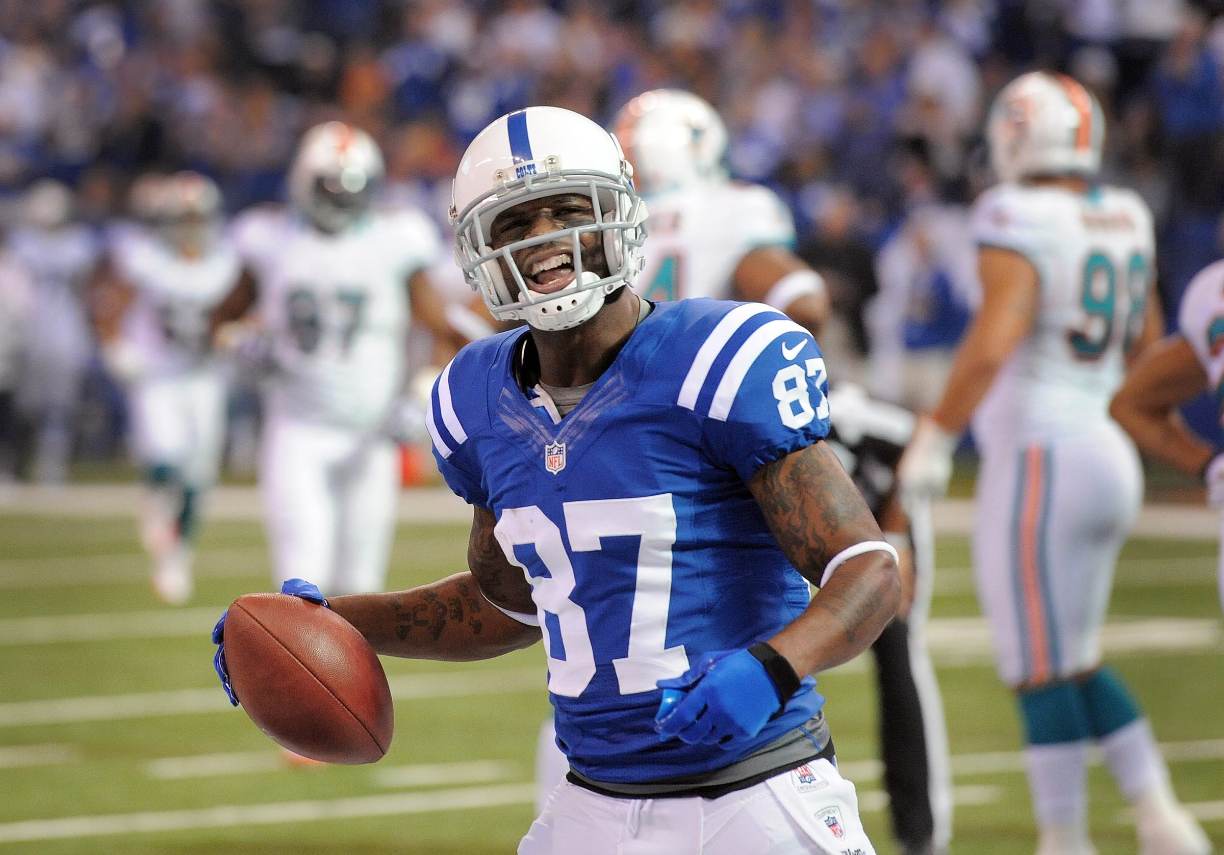 In 14 seasons with the Colts Reggie Wayne compiled 14,345 yards receiving and 82 touchdowns.