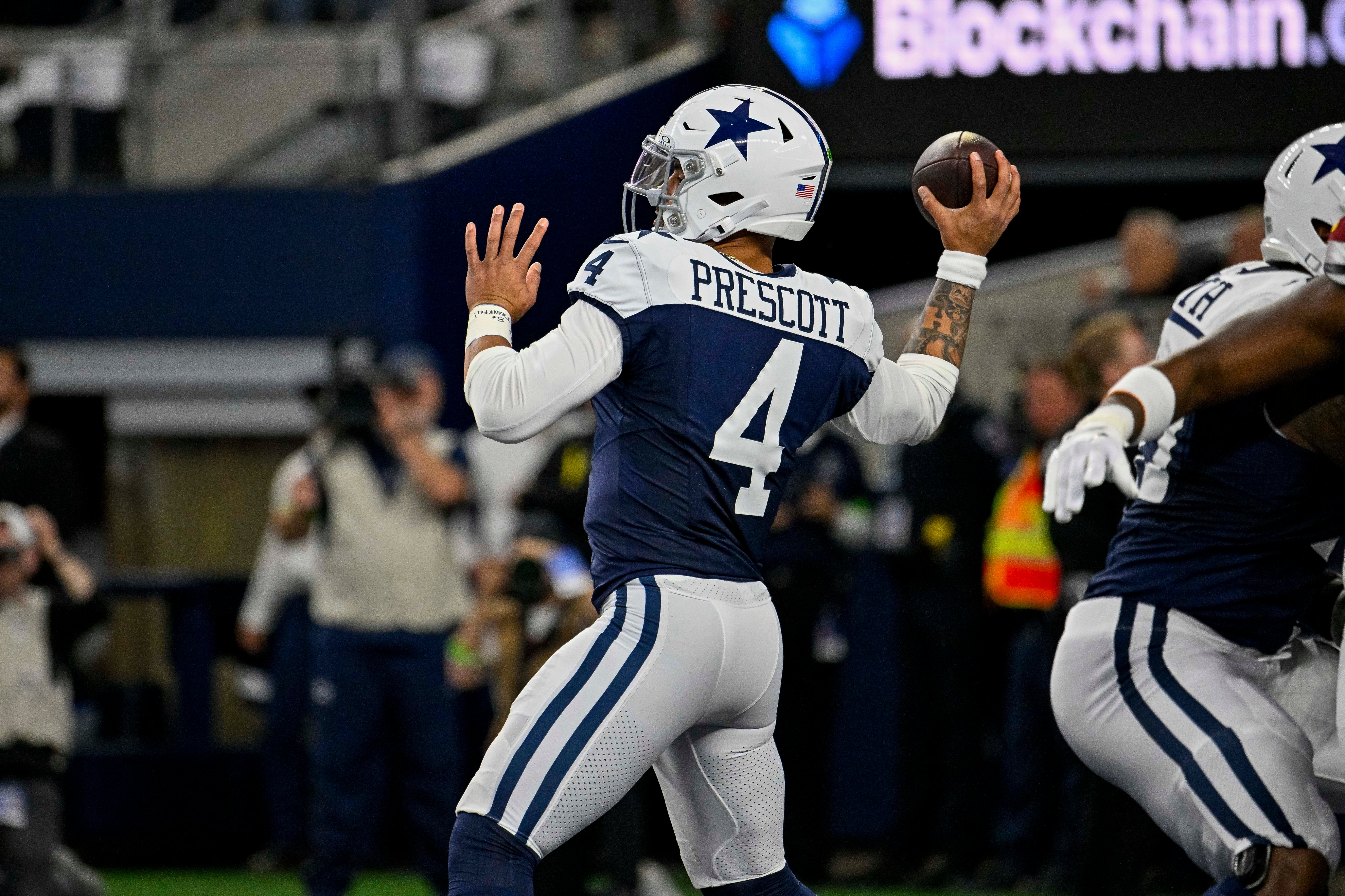 Dallas Cowboys quarterback Dak Prescott (4) in action during the game between the Dallas Cowboys and the Washington Commanders at AT&T Stadium.