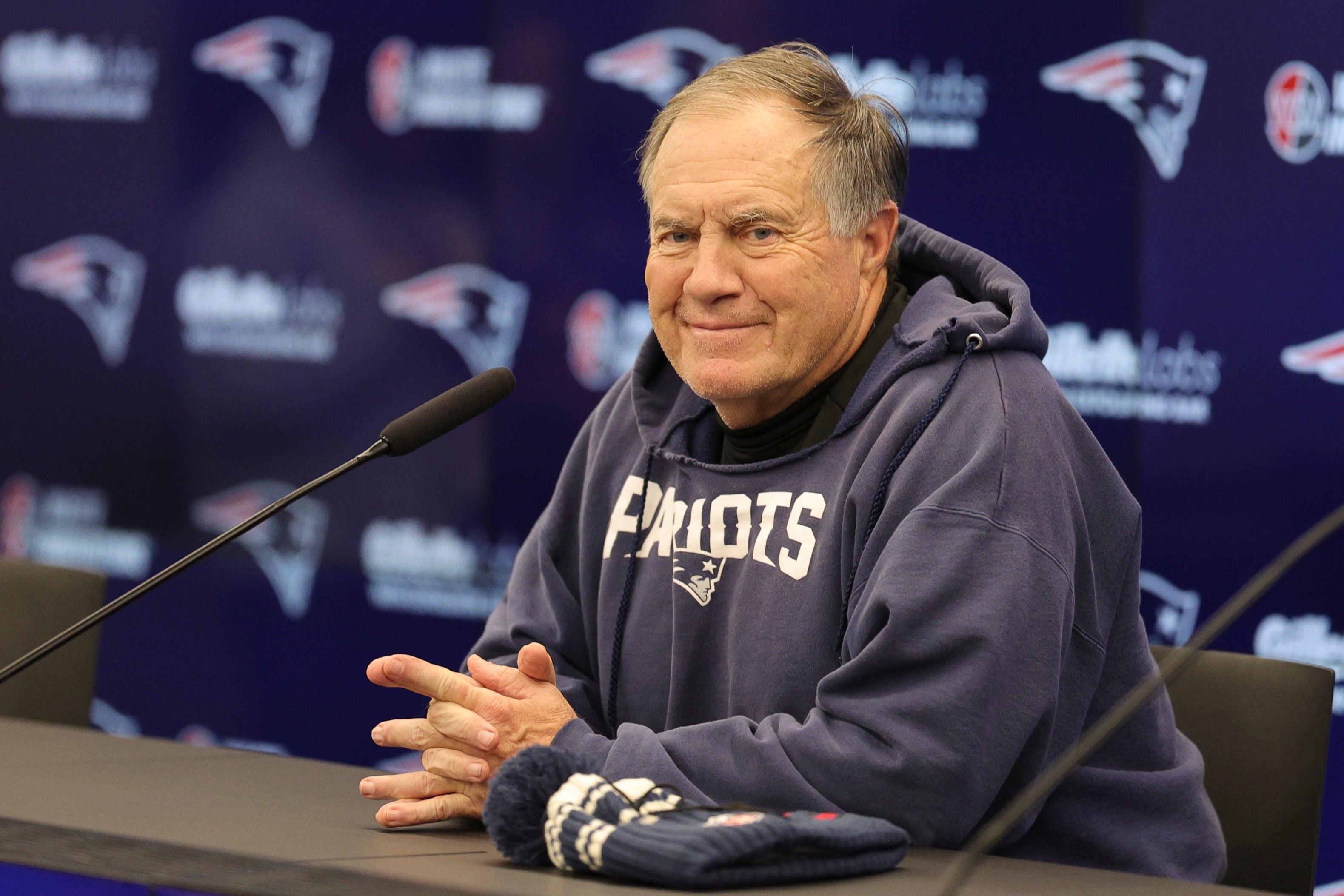New England Patriots head coach Bill Belichick speaks to the media before an NFL International Series practice at the Deutcher Fussball-Bund facility
