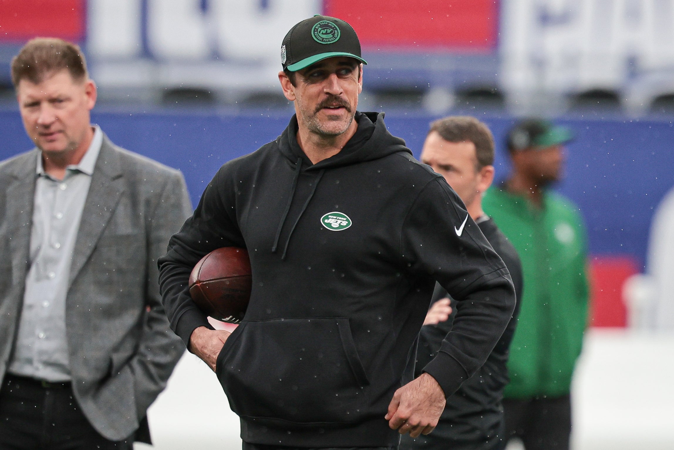 New York Jets quarterback Aaron Rodgers on the field before the game against the New York Giants at MetLife Stadium.