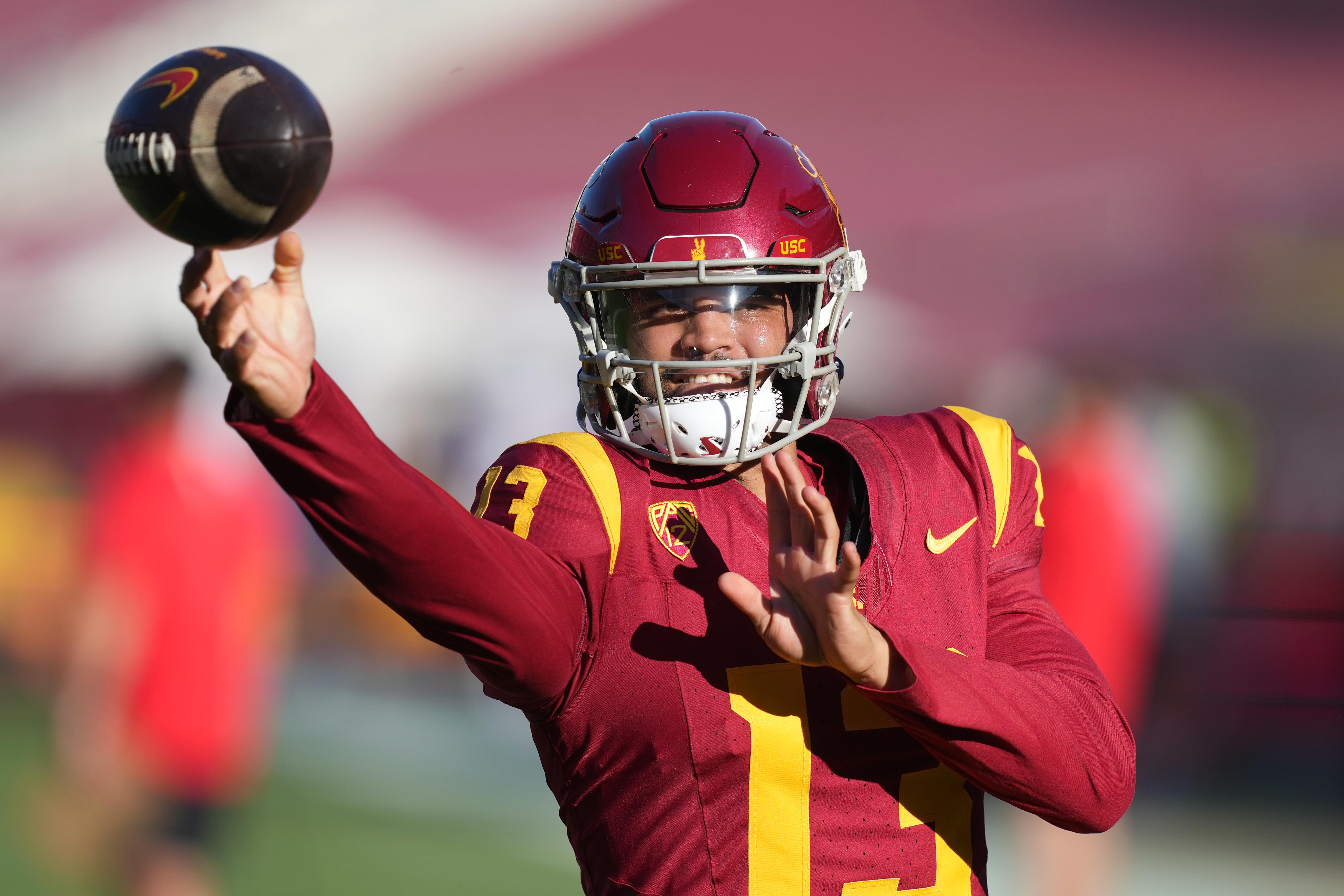 Oct 21, 2023; Los Angeles, California, USA; Southern California Trojans quarterback Caleb Williams (13) throws the ball during the game against the Utah Utes at United Airlines Field at Los Angeles Memorial Coliseum.