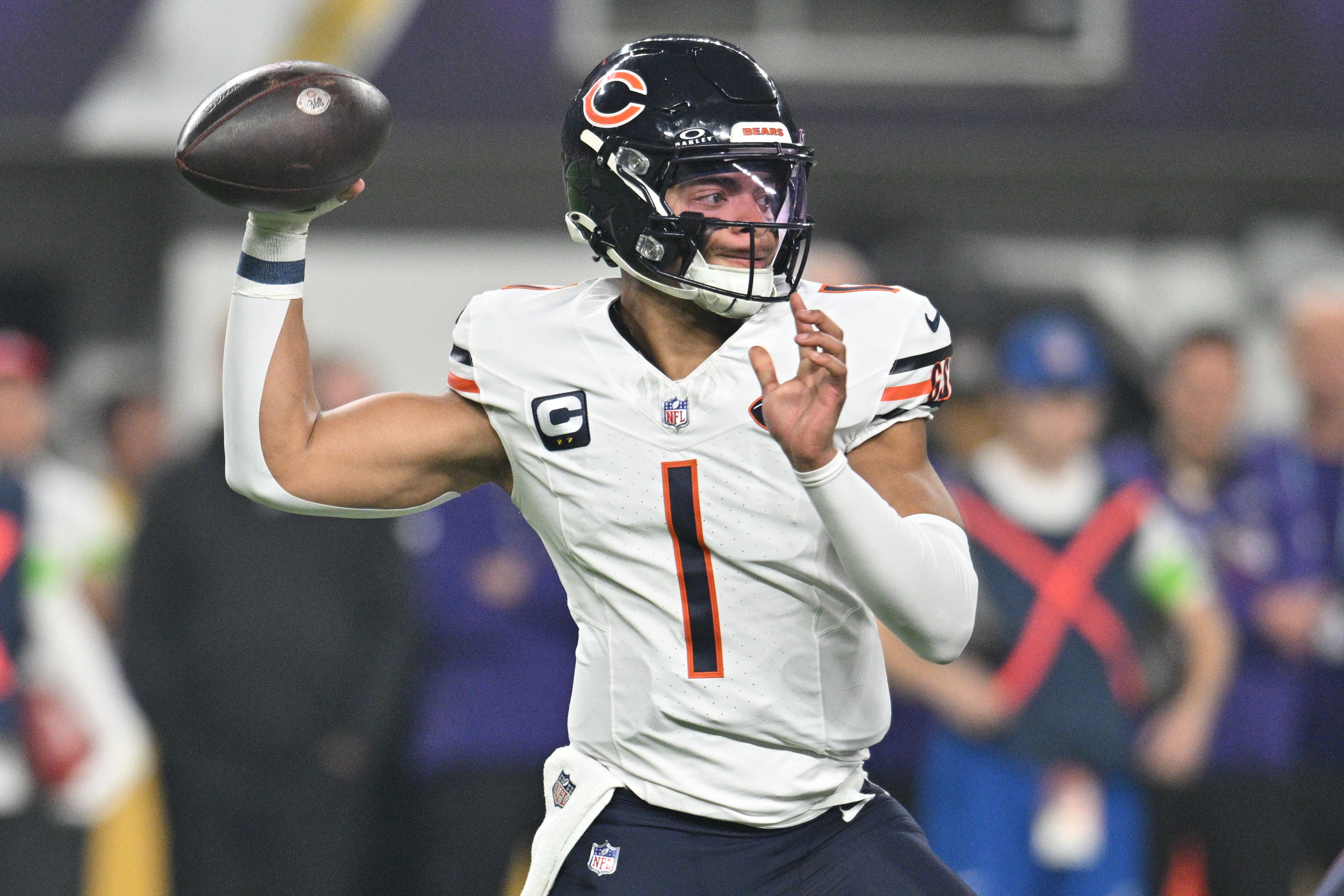 Nov 27, 2023; Minneapolis, Minnesota, USA; Chicago Bears quarterback Justin Fields (1) throws a pass against the Minnesota Vikings during the first quarter at U.S. Bank Stadium. Mandatory Credit: Jeffrey Becker-USA TODAY Sports