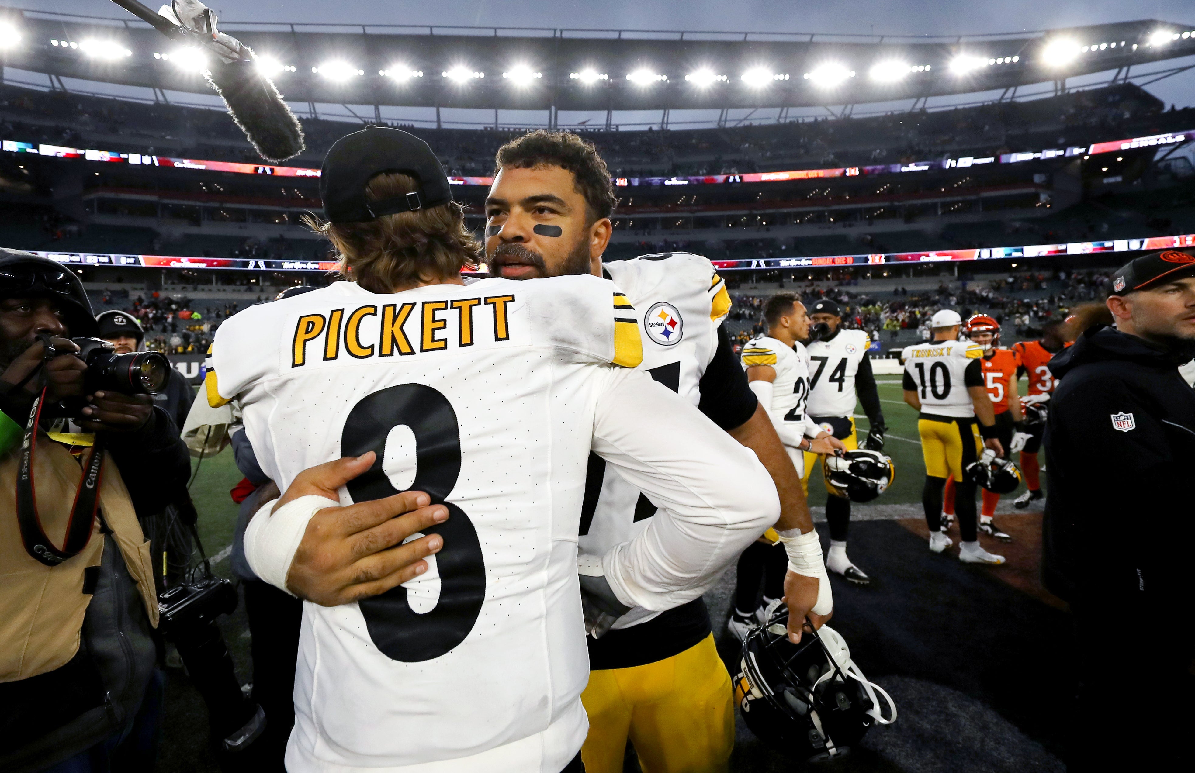 Nov 26, 2023; Cincinnati, Ohio, USA; Pittsburgh Steelers quarterback Kenny Pickett (8) and defensive tackle Cameron Heyward (97) celebrate after the game against the Cincinnati Bengals at Paycor Stadium. Mandatory Credit: Joseph Maiorana-USA TODAY Sports