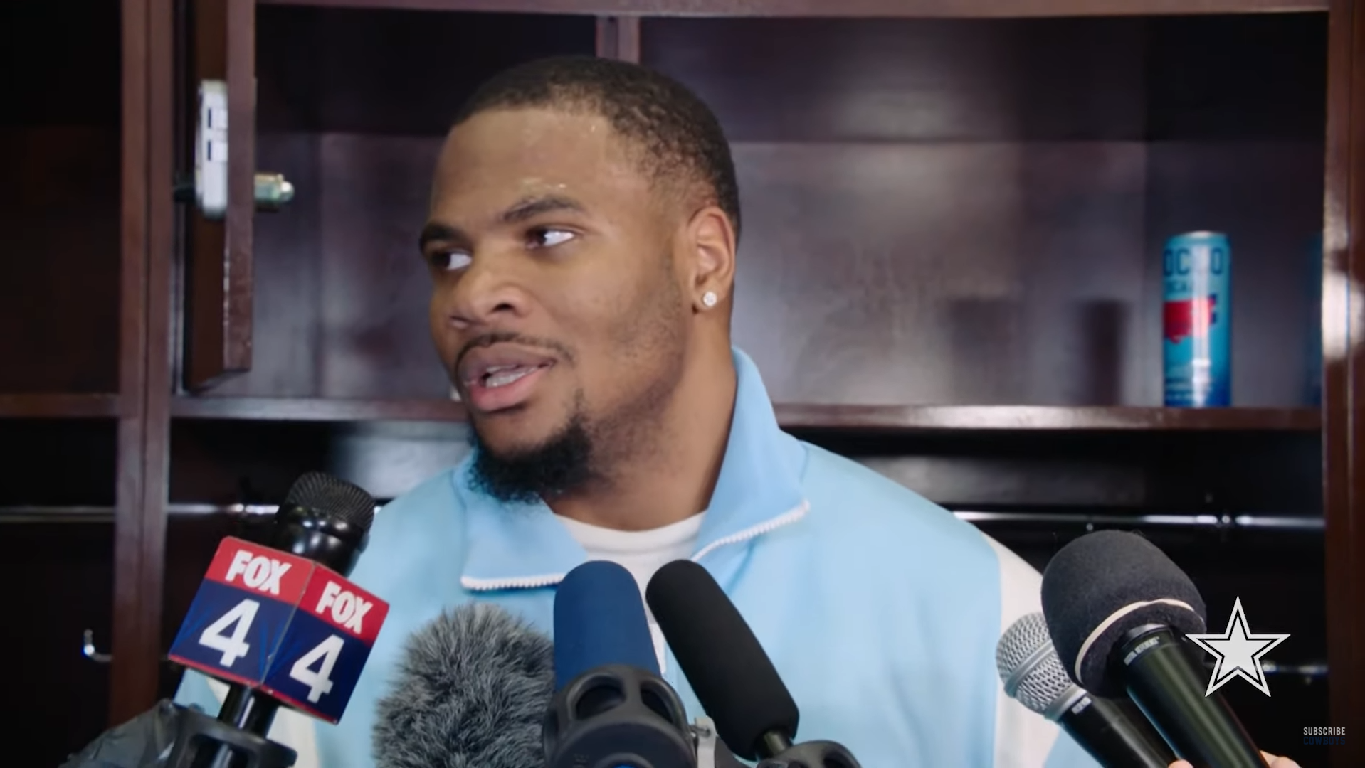 Dallas Cowboys EDGE Micah Parsons talks to reporters postgame following his team's win over the Seattle Seahawks inn Week 13.