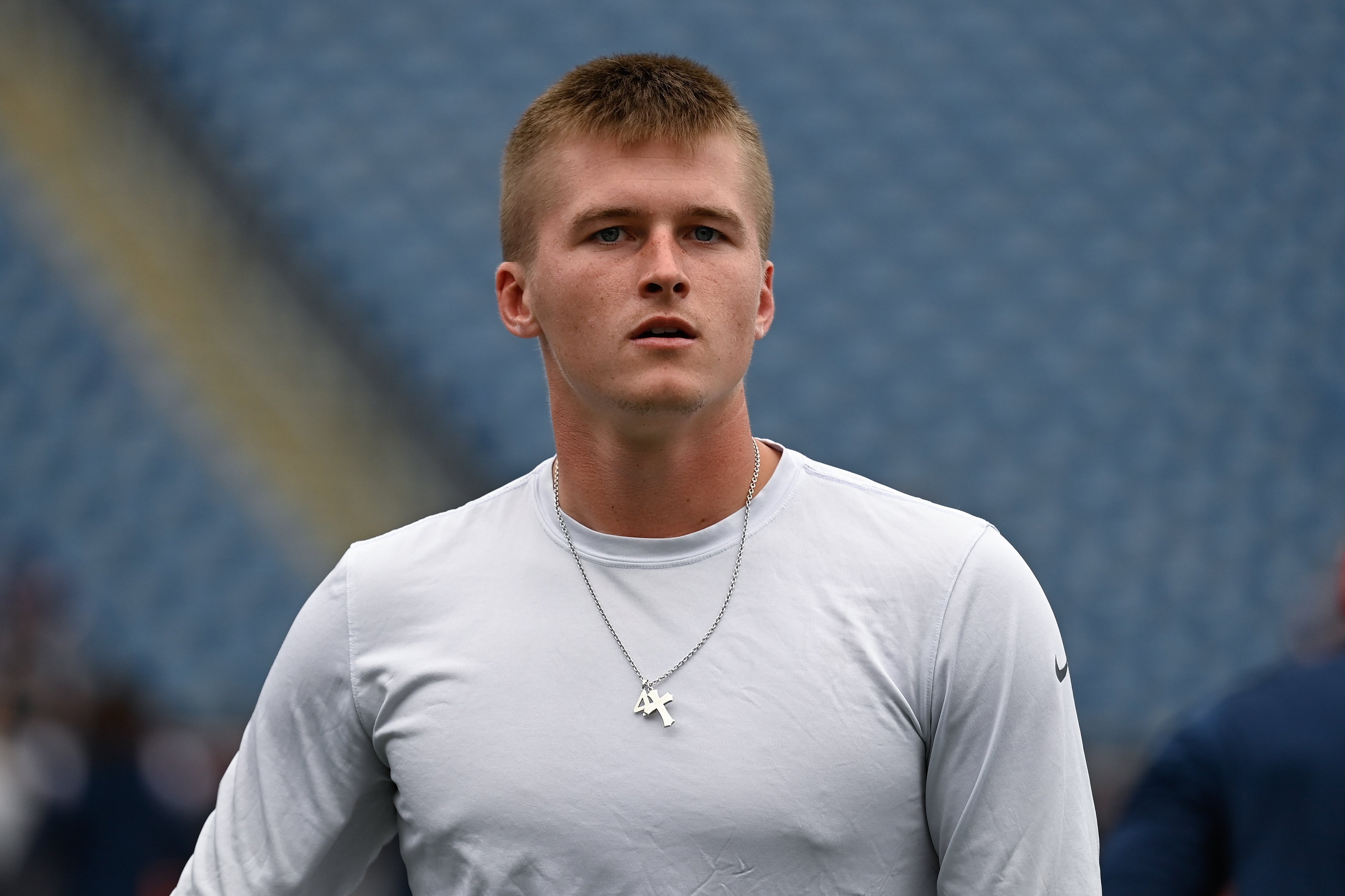 New England Patriots quarterback Bailey Zappe warms up before a game against the Houston Texans at Gillette Stadium.