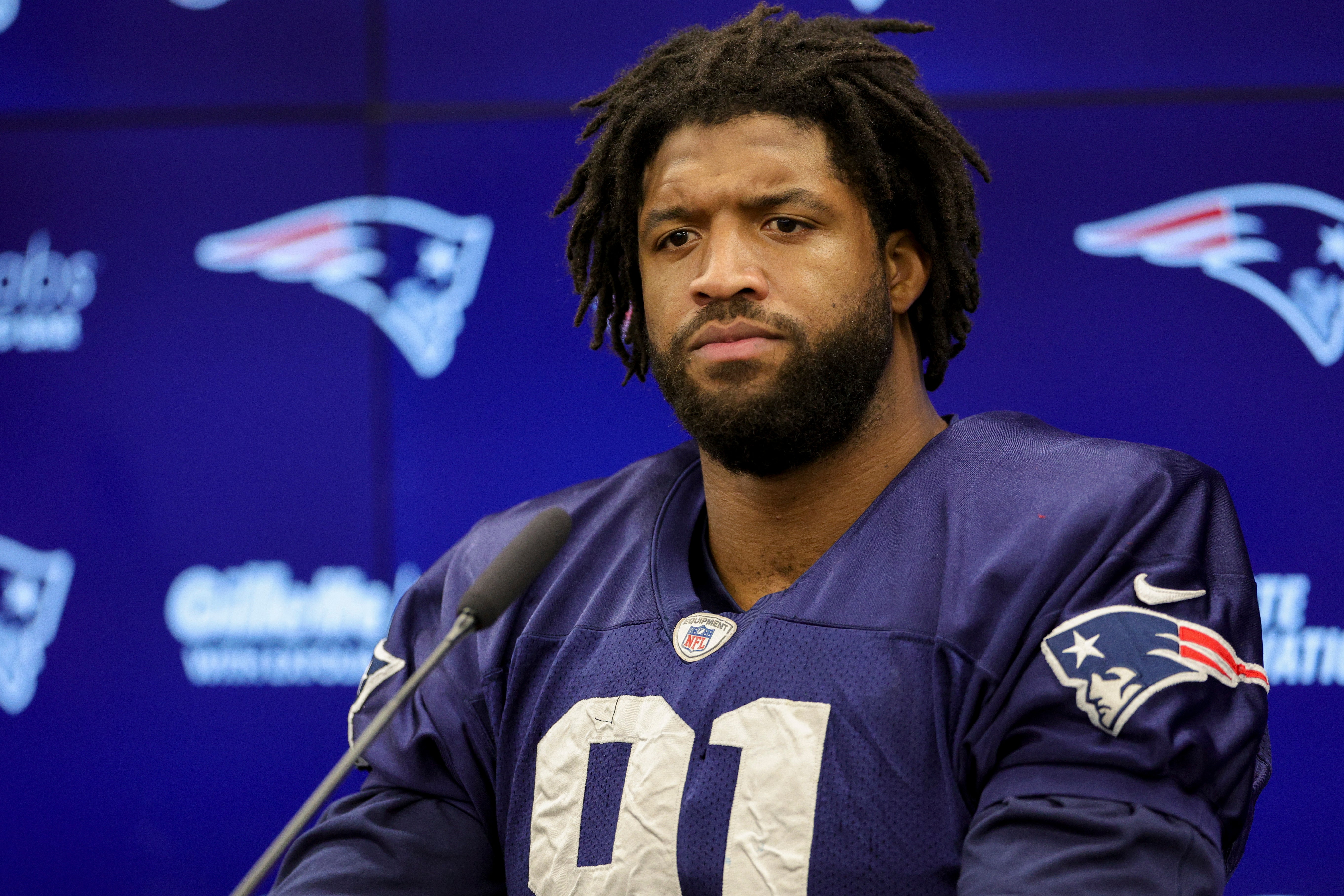 New England Patriots defensive end Deatrich Wise Jr. speaks to the media before an NFL International Series practice at the Deutcher Fussball-Bund facility