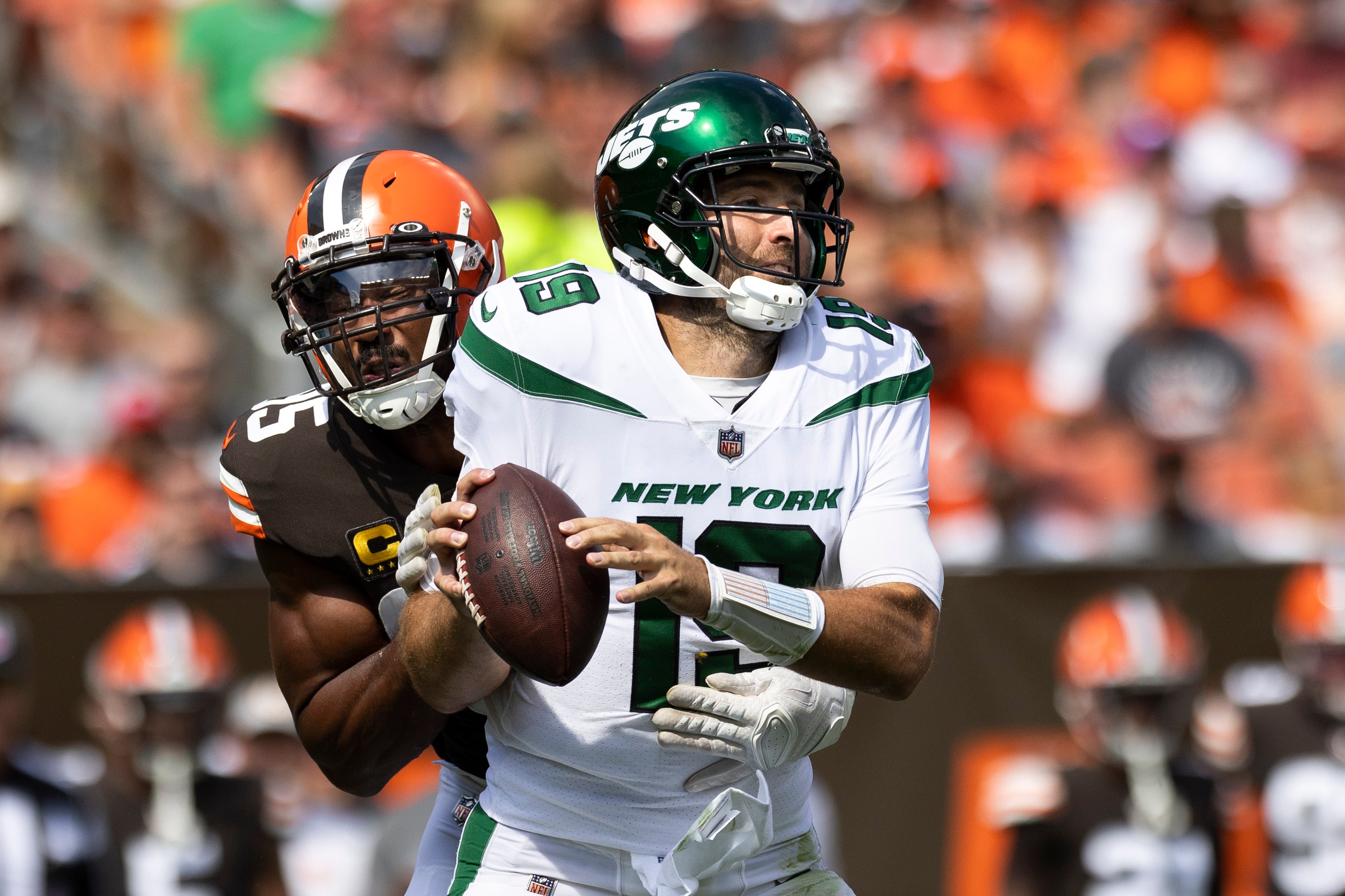 Sep 18, 2022; Cleveland, Ohio, USA; Cleveland Browns defensive end Myles Garrett (95) hits New York Jets quarterback Joe Flacco (19) during the second quarter at FirstEnergy Stadium. Mandatory Credit: Scott Galvin-USA TODAY Sports.