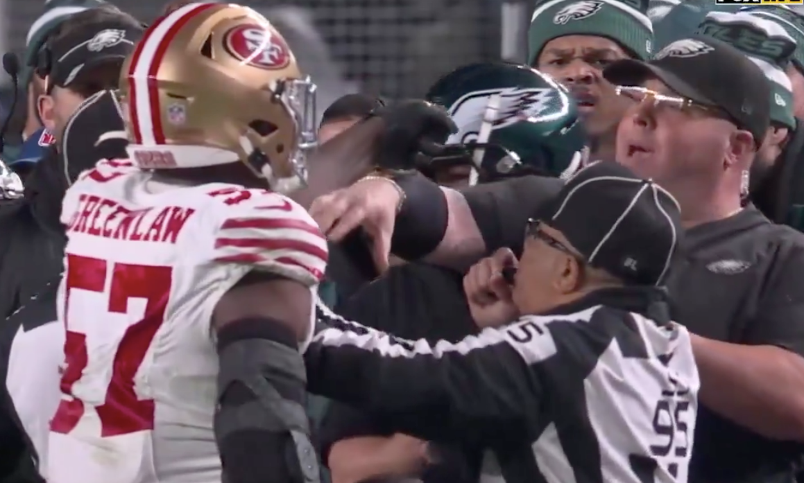 Linebacker Dre Greenlaw and security guard Dom DiSandro are ejected during third quarter of Eagles-49ers Week 13 matchup.