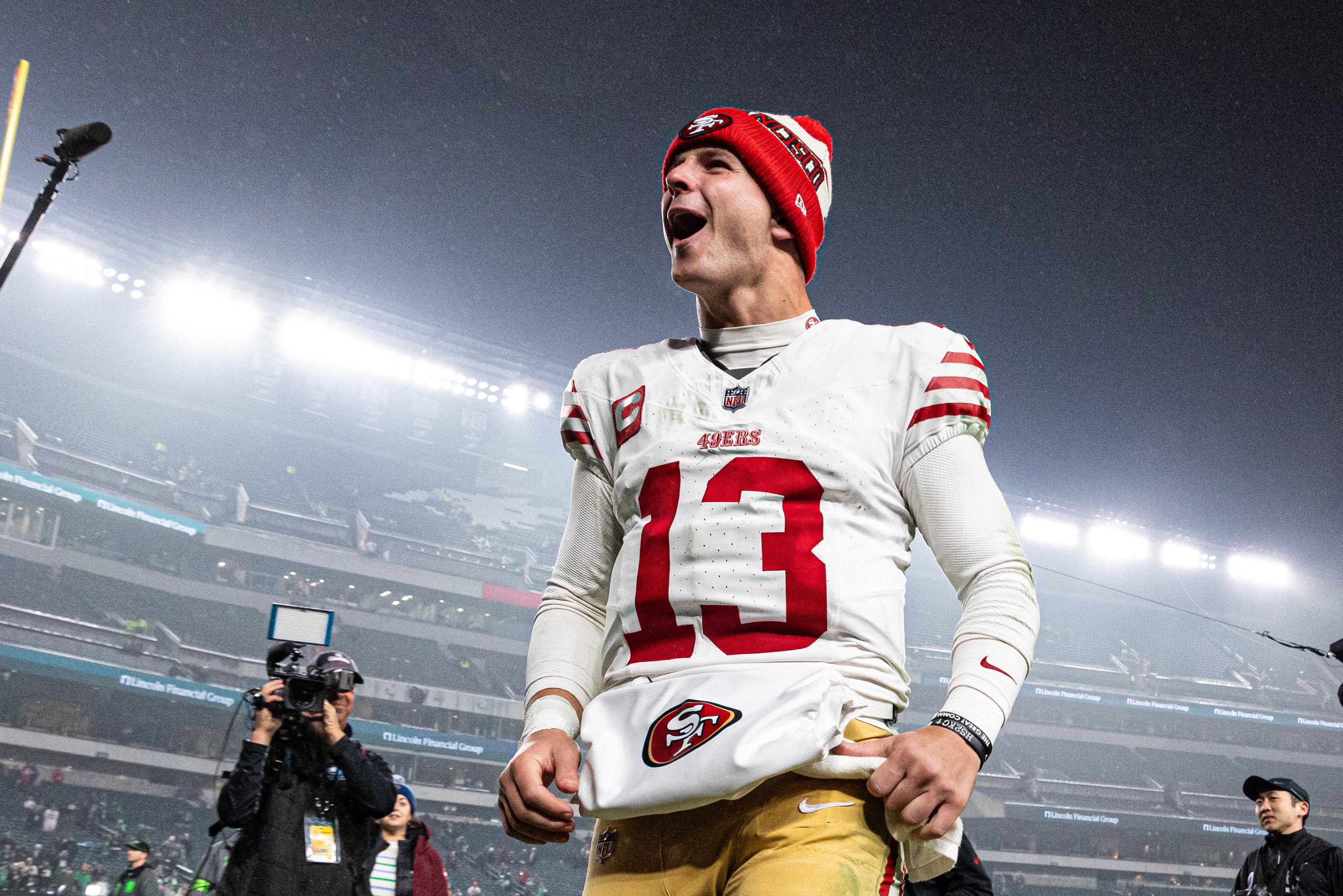 Dec 3, 2023; Philadelphia, Pennsylvania, USA; San Francisco 49ers quarterback Brock Purdy (13) celebrates as he walks off the field after a victory against the Philadelphia Eagles at Lincoln Financial Field.