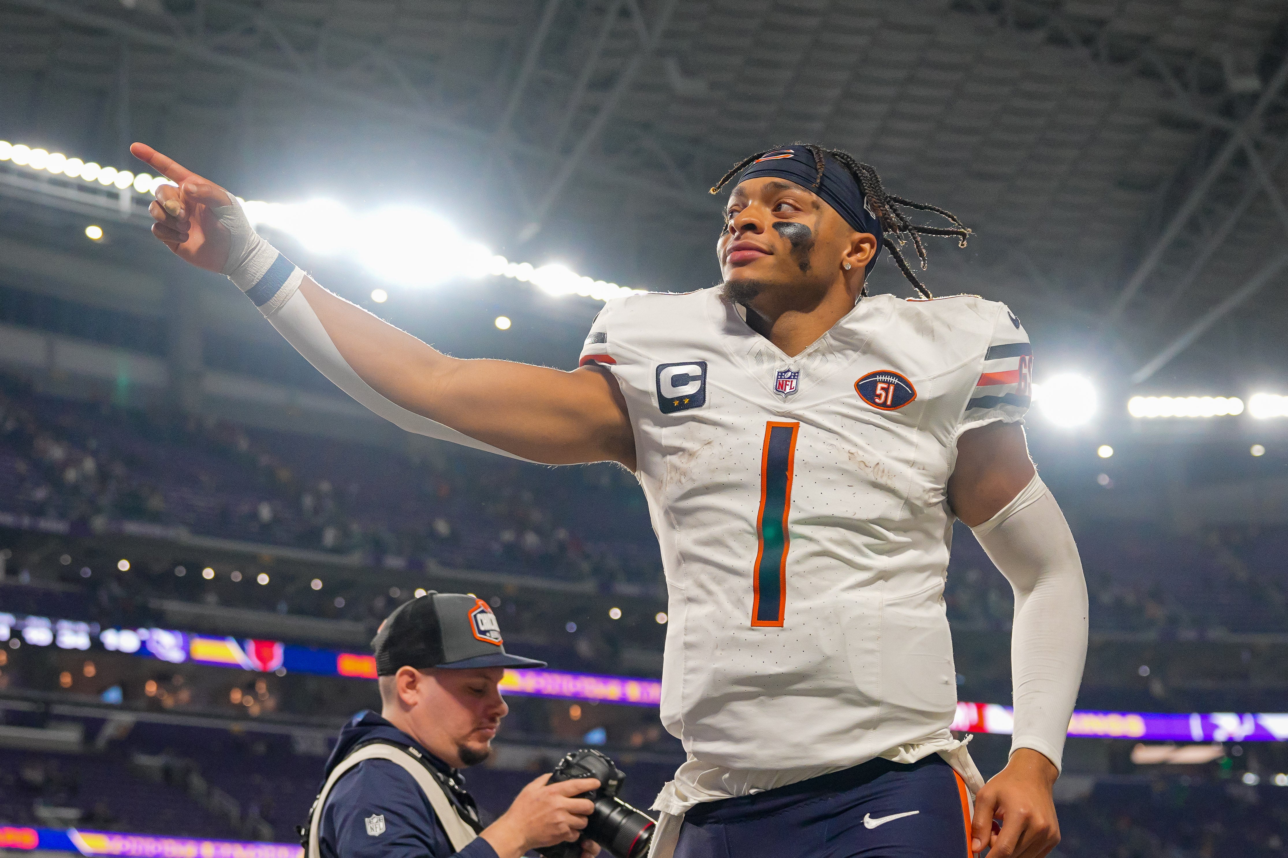 Nov 27, 2023; Minneapolis, Minnesota, USA; Chicago Bears quarterback Justin Fields (1) leaves the field after the game against the Minnesota Vikings at U.S. Bank Stadium.
