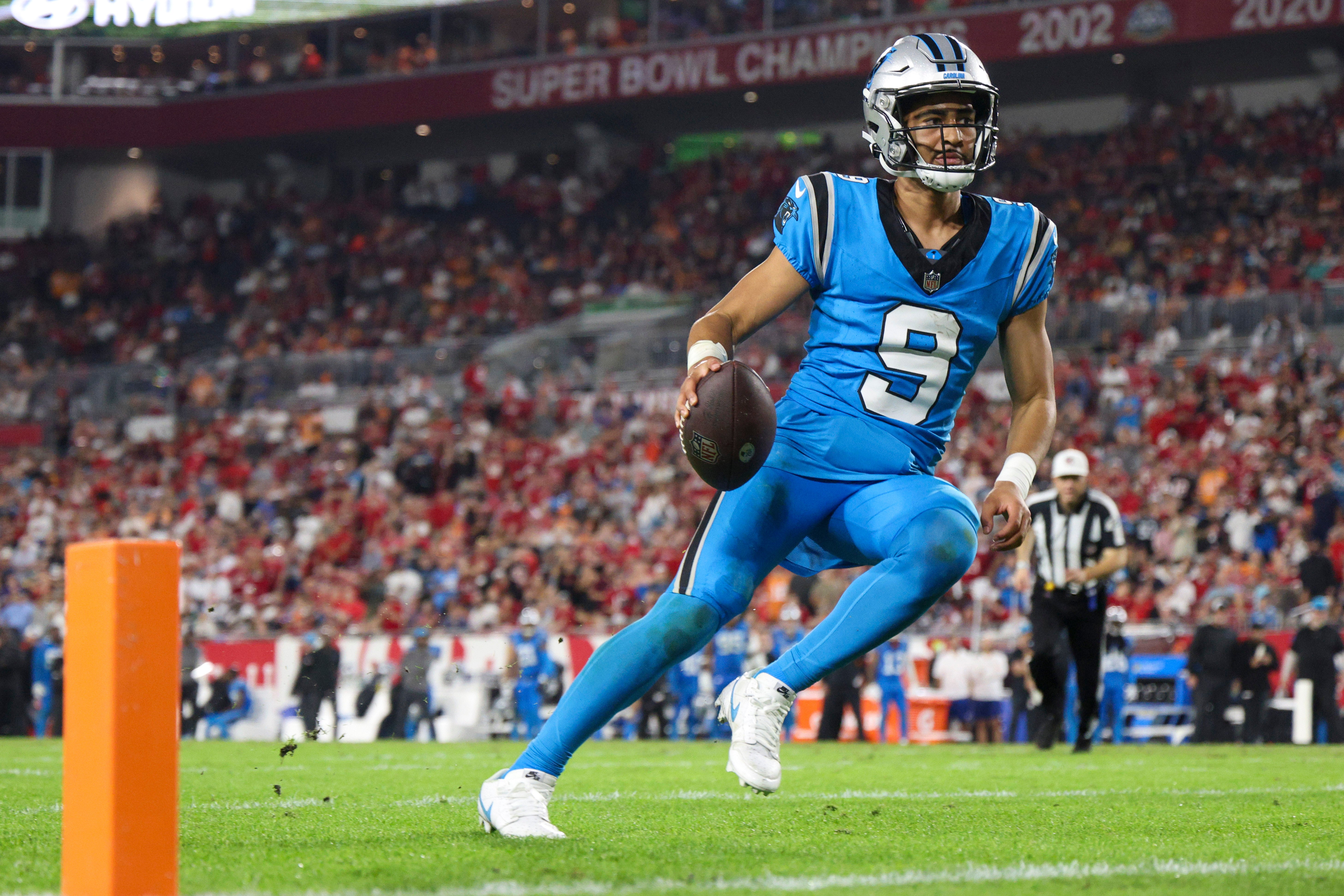 Dec 3, 2023; Tampa, Florida, USA; Carolina Panthers quarterback Bryce Young (9) scores on a two point conversion against the Tampa Bay Buccaneers in the fourth quarter at Raymond James Stadium. Mandatory Credit: Nathan Ray Seebeck-USA TODAY Sports
