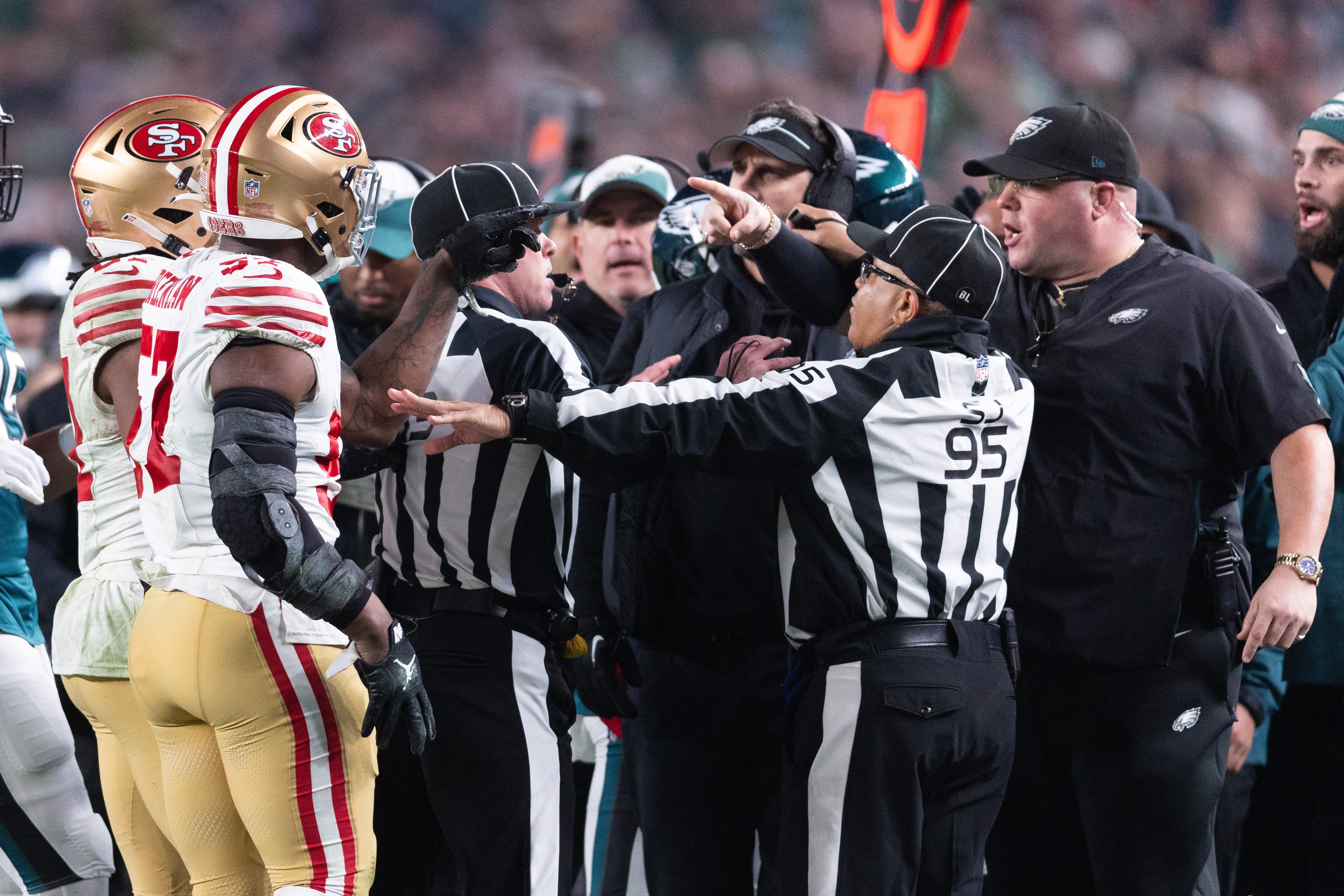 Dec 3, 2023; Philadelphia, Pennsylvania, USA; San Francisco 49ers linebacker Dre Greenlaw (57) has an altercation with Philadelphia Eagles staff member Dom DiSandro during the third quarter at Lincoln Financial Field.