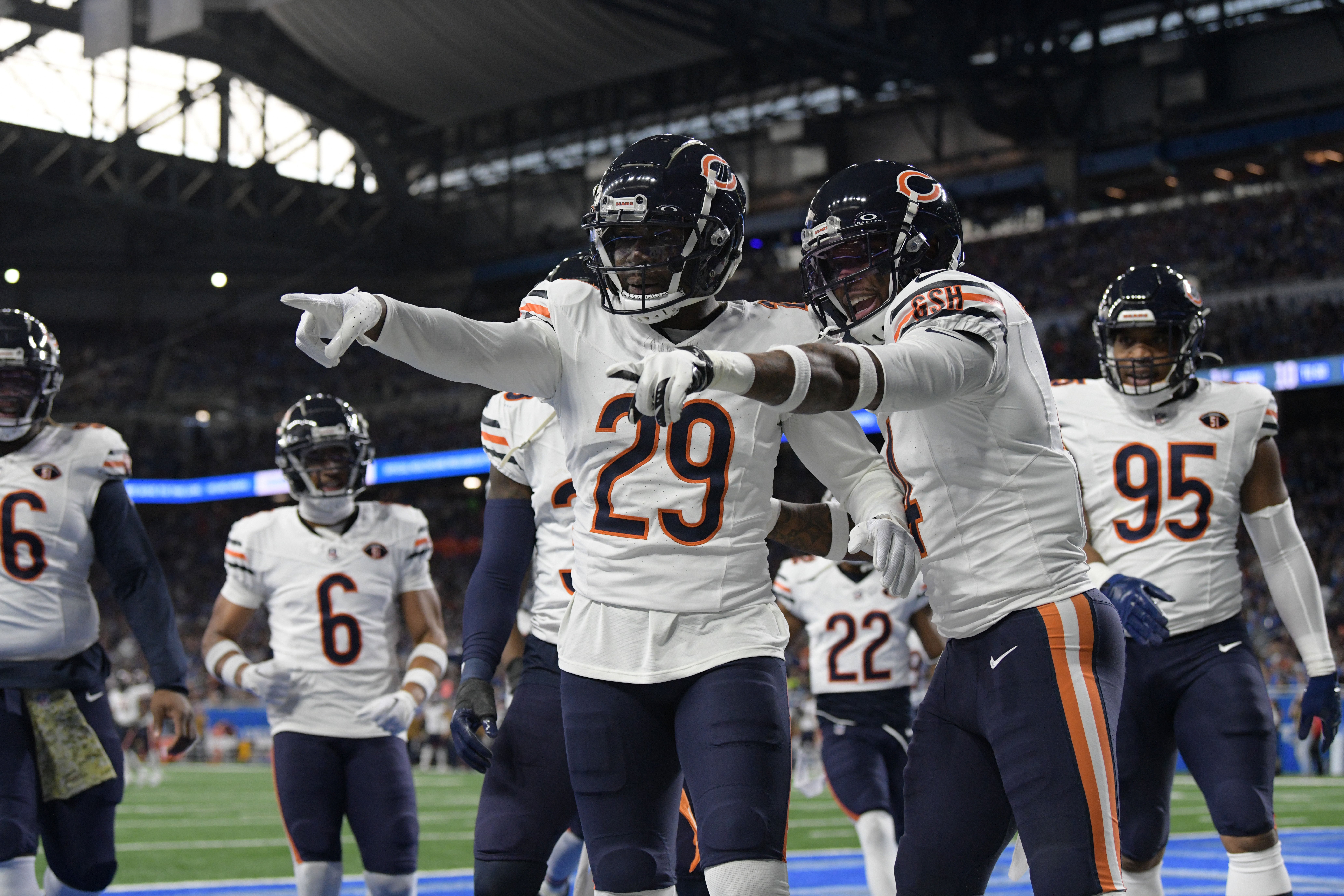 Nov 19, 2023; Detroit, Michigan, USA; Chicago Bears cornerback Tyrique Stevenson (29) celebrates after he intercepts a pass against the Detroit Lions in the first quarter at Ford Field.