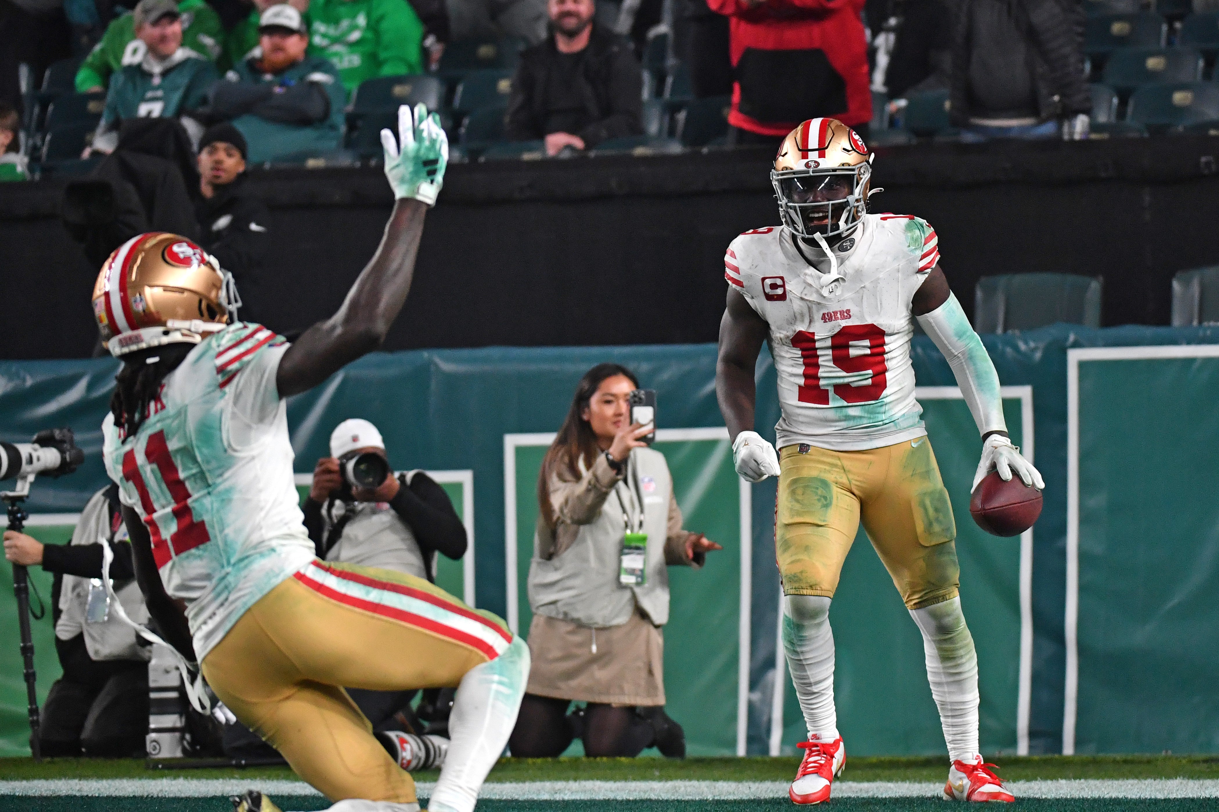 Dec 3, 2023; Philadelphia, Pennsylvania, USA; San Francisco 49ers wide receiver Deebo Samuel (19) celebrates after scoring a touchdown against the Philadelphia Eagles during the fourth quarter at Lincoln Financial Field.