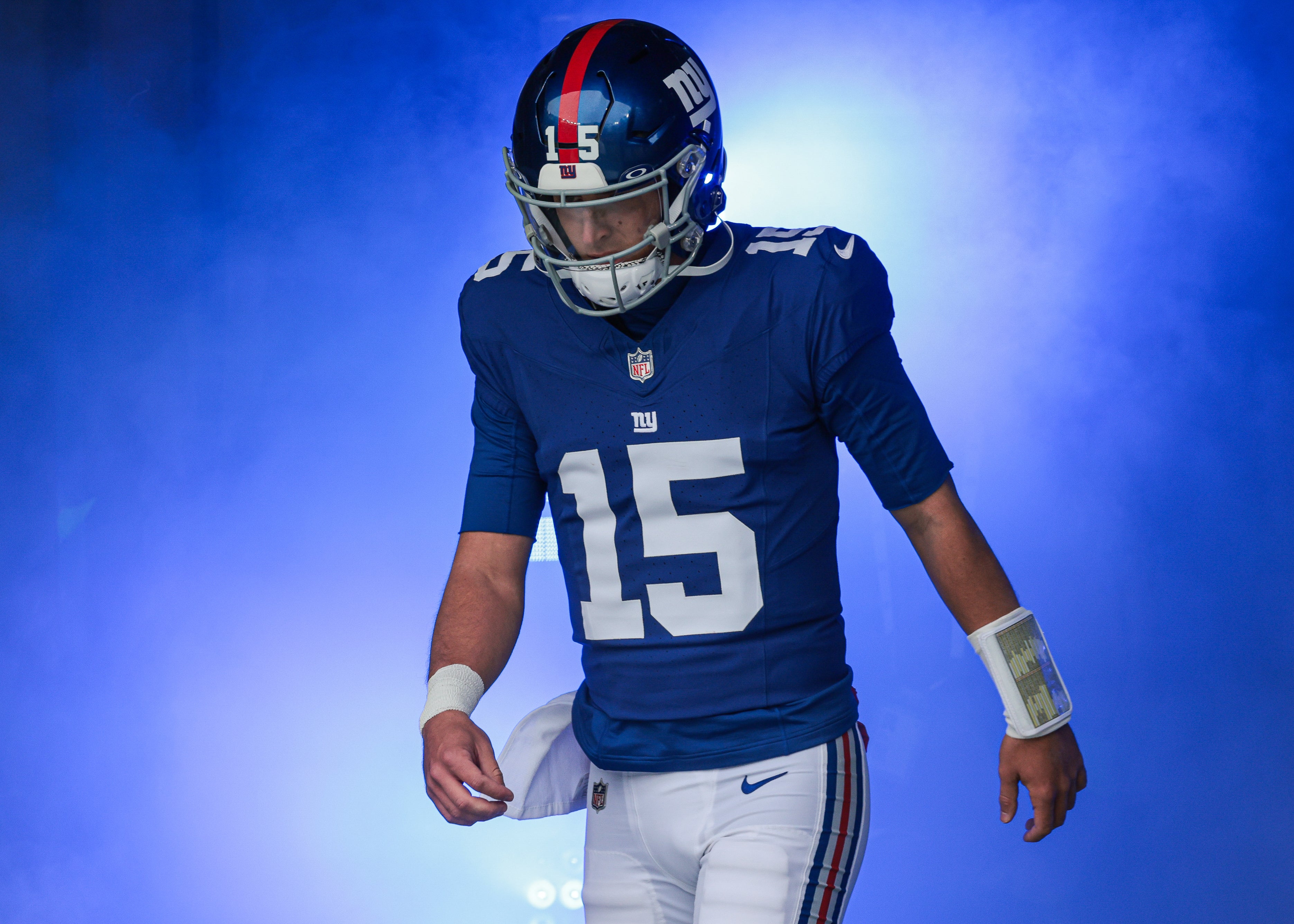 New York Giants quarterback Tommy DeVito enters the field before the game against the New England Patriots at MetLife Stadium