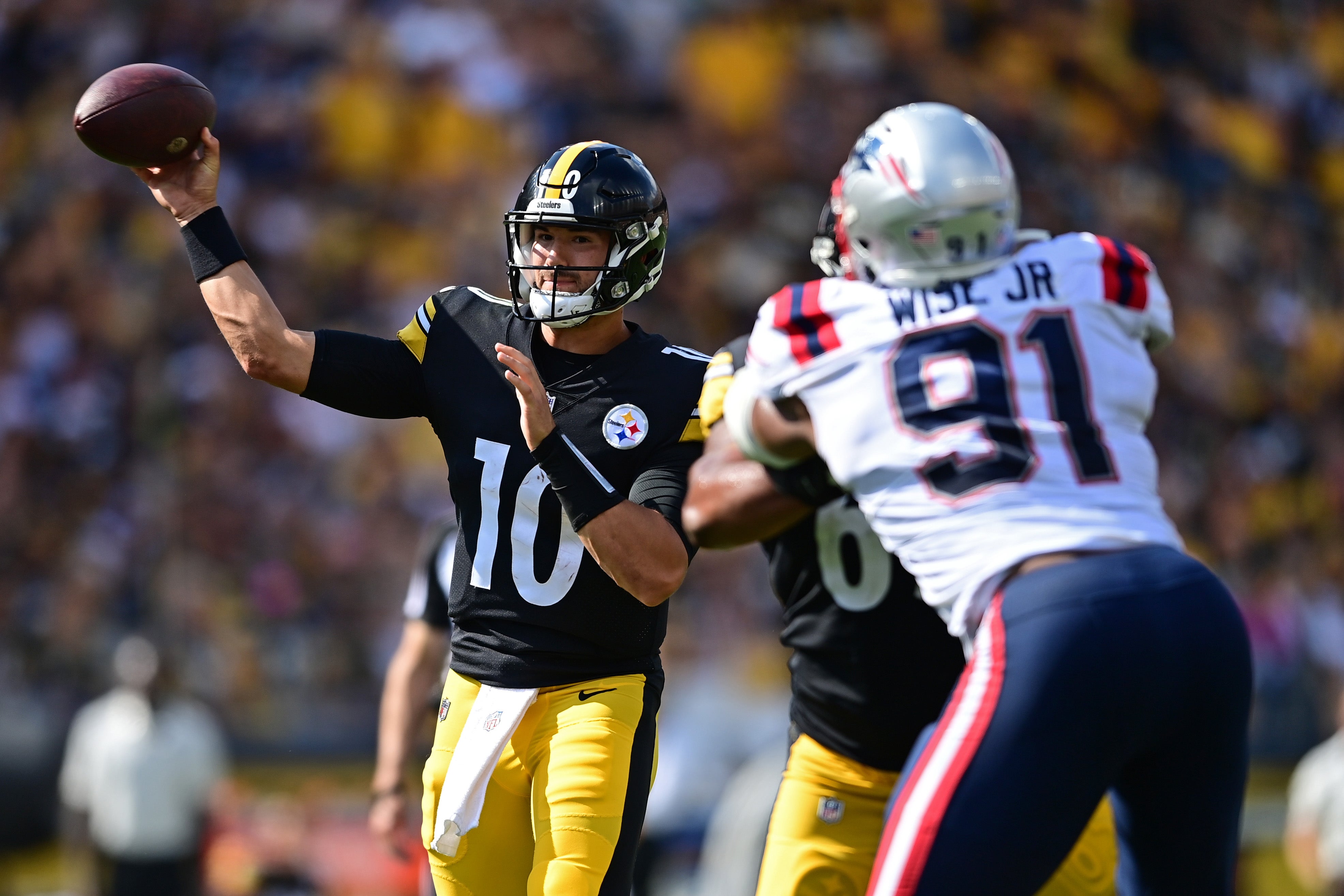 Sep 18, 2022; Pittsburgh, Pennsylvania, USA; Pittsburgh Steelers quarterback Mitch Trubisky (10) throws a touchdown pass during the fourth quarter against the New England Patriots at Acrisure Stadium. Mandatory Credit: David Dermer-USA TODAY Sports